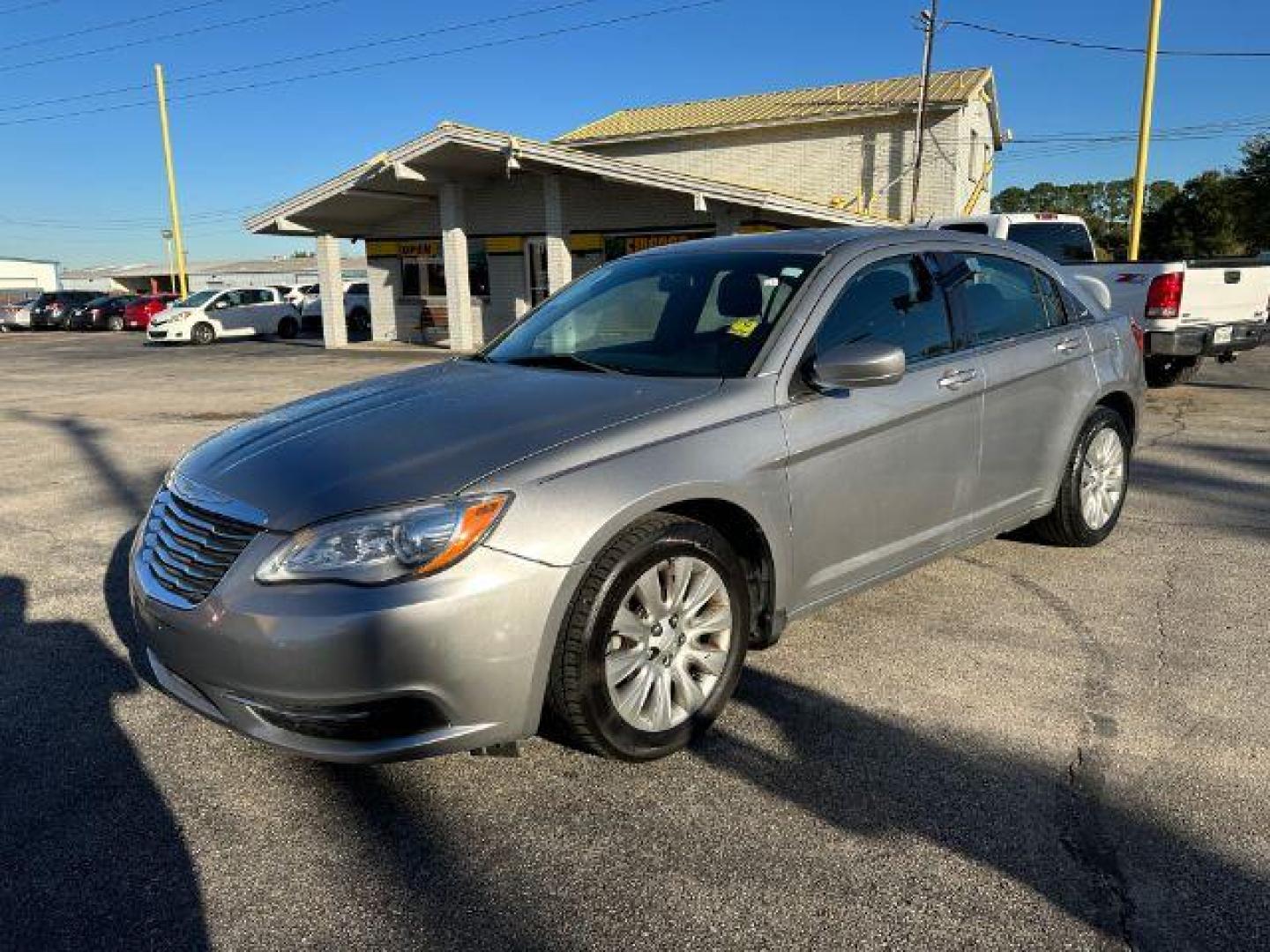 2014 Chrysler 200 LX (1C3CCBABXEN) with an 2.4L L4 DOHC 16V engine, 6-Speed Automatic transmission, located at 2715 W Pioneer Pkwy, Arlington, TX, 76013, (817) 265-9009, 32.710262, -97.153236 - Photo#2