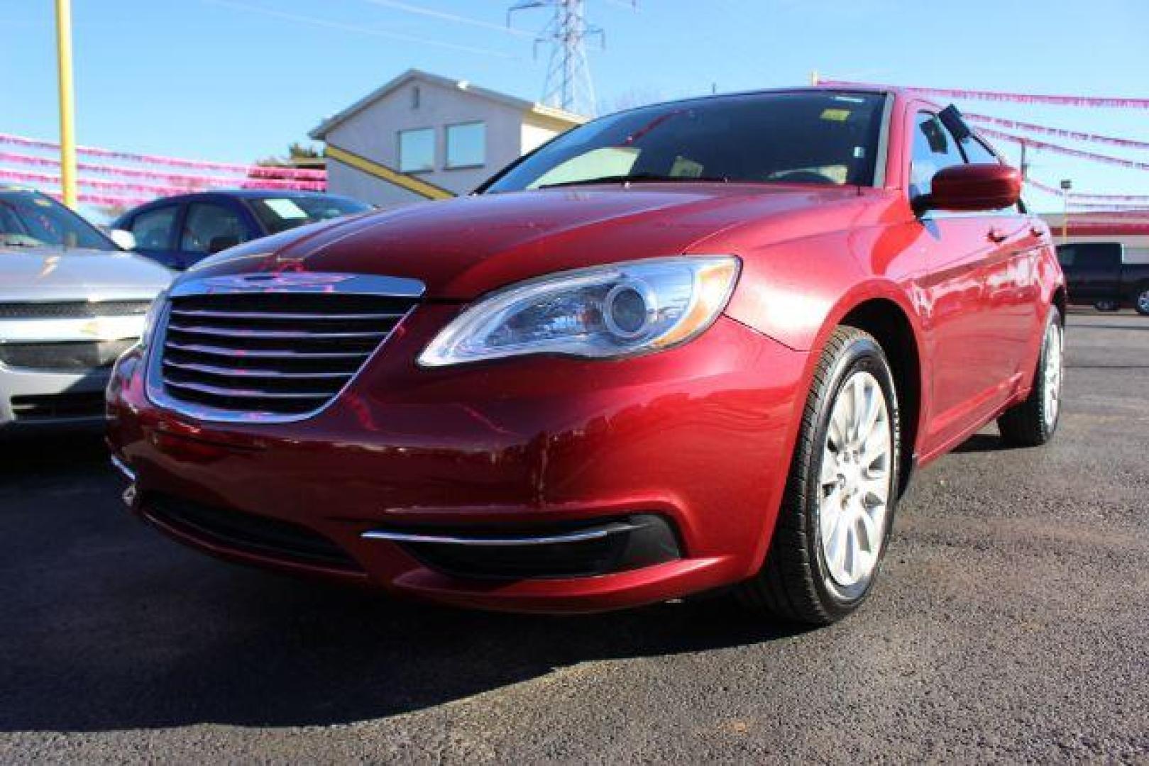 2014 Red Chrysler 200 LX (1C3CCBAB0EN) with an 2.4L L4 DOHC 16V engine, 6-Speed Automatic transmission, located at 2715 W Pioneer Pkwy, Arlington, TX, 76013, (817) 265-9009, 32.710262, -97.153236 - Photo#1