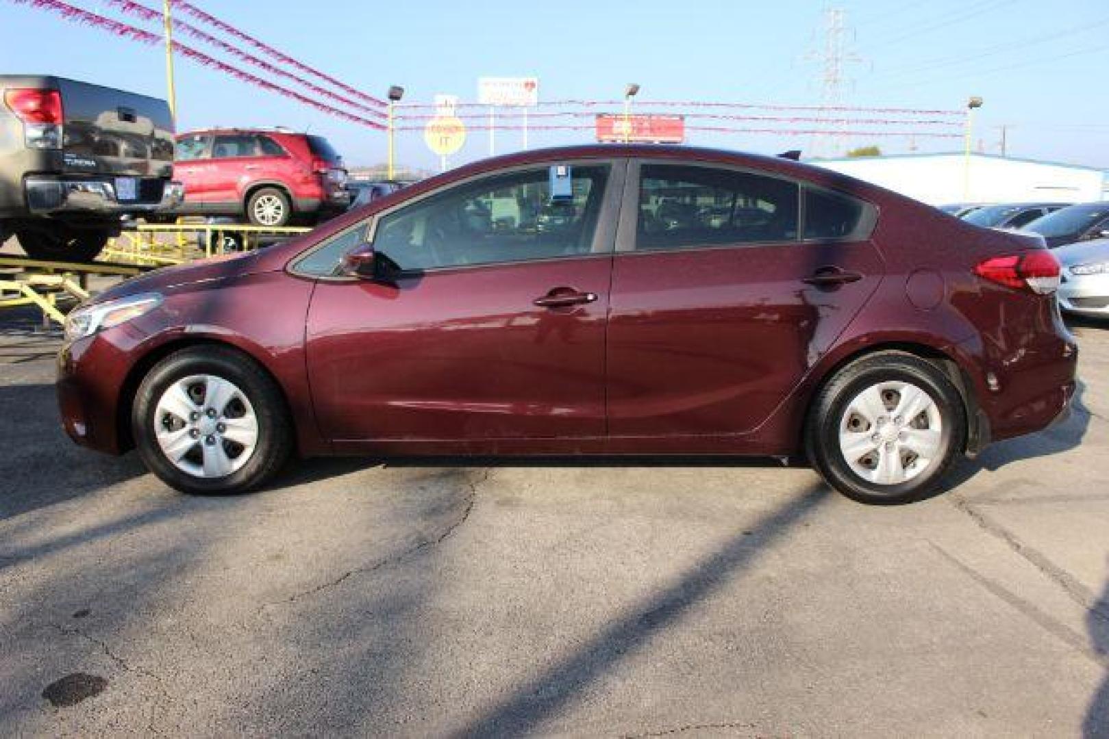 2018 MAROON Kia Forte LX 6A (3KPFK4A72JE) with an 2.0L L4 DOHC 16V engine, 6-Speed Automatic transmission, located at 2715 W Pioneer Pkwy, Arlington, TX, 76013, (817) 265-9009, 32.710262, -97.153236 - Photo#1