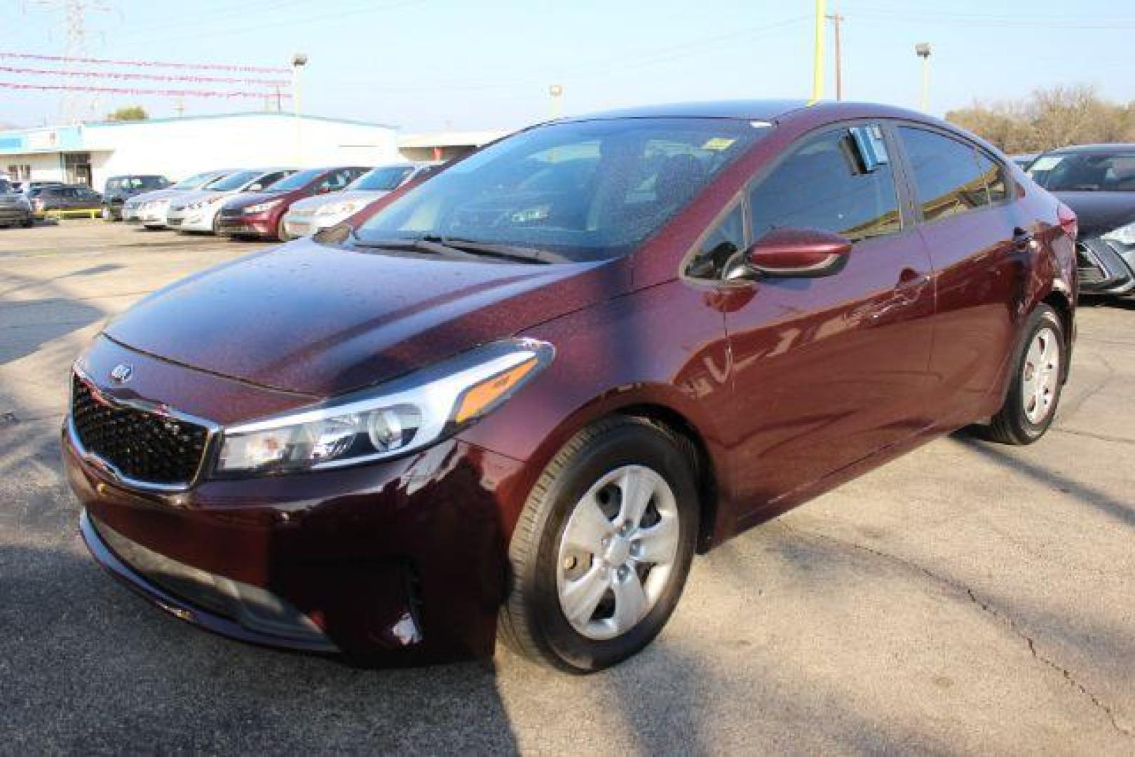 2018 MAROON Kia Forte LX 6A (3KPFK4A72JE) with an 2.0L L4 DOHC 16V engine, 6-Speed Automatic transmission, located at 2715 W Pioneer Pkwy, Arlington, TX, 76013, (817) 265-9009, 32.710262, -97.153236 - Photo#2