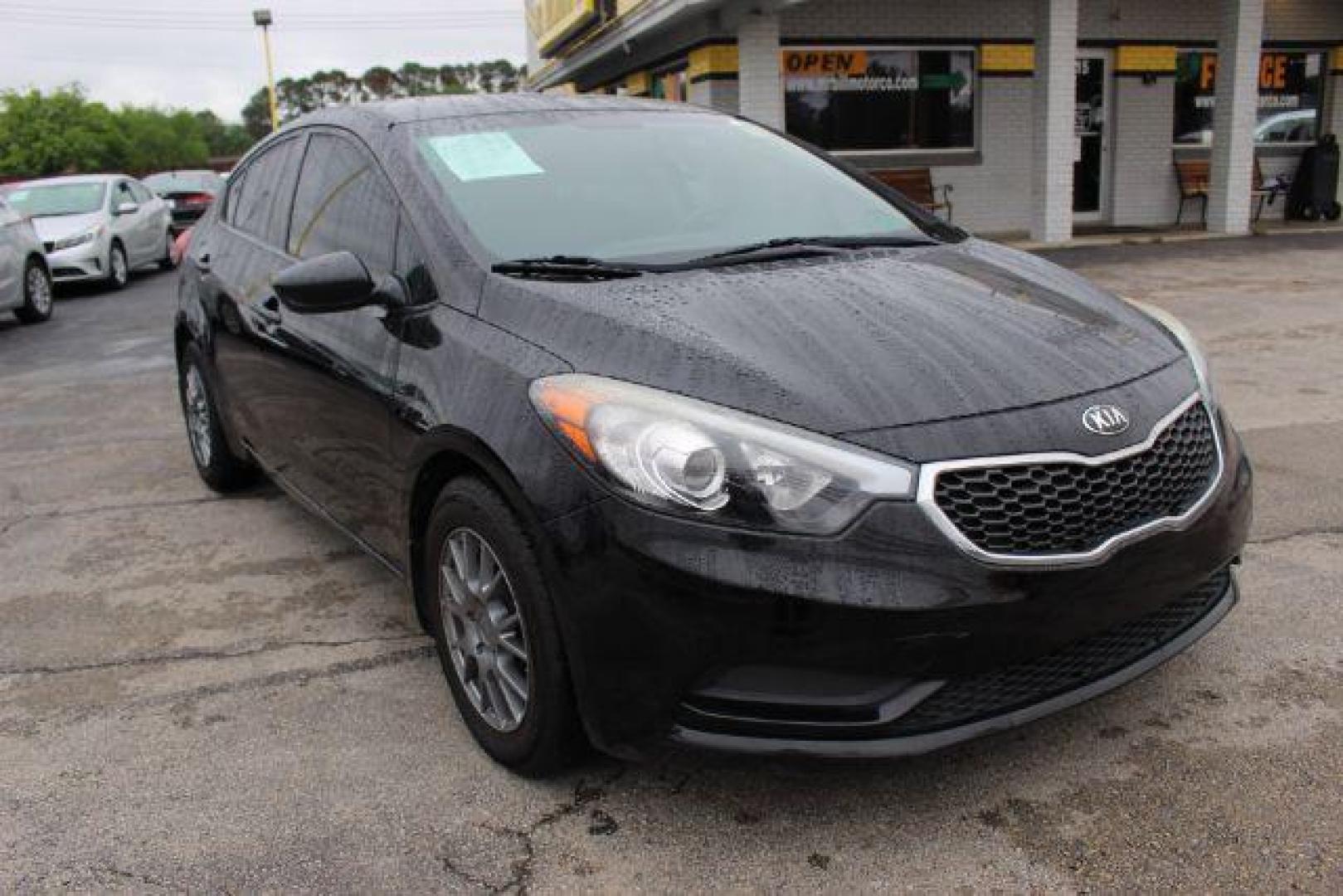 2014 BLACK Kia Forte LX A6 (KNAFK4A66E5) with an 1.8L L4 DOHC 16V engine, 6-Speed Automatic transmission, located at 2715 W Pioneer Pkwy, Arlington, TX, 76013, (817) 265-9009, 32.710262, -97.153236 - Photo#4