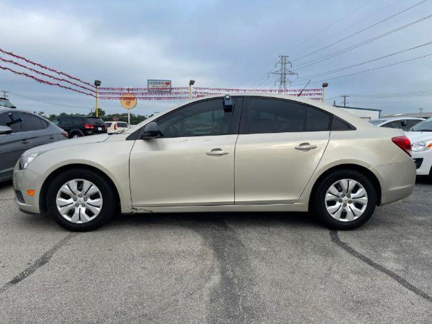 2014 GOLD Chevrolet Cruze LS Auto (1G1PA5SH6E7) with an 1.8L L4 DOHC 16V FFV engine, 6-Speed Automatic transmission, located at 2715 W Pioneer Pkwy, Arlington, TX, 76013, (817) 265-9009, 32.710262, -97.153236 - Photo#1