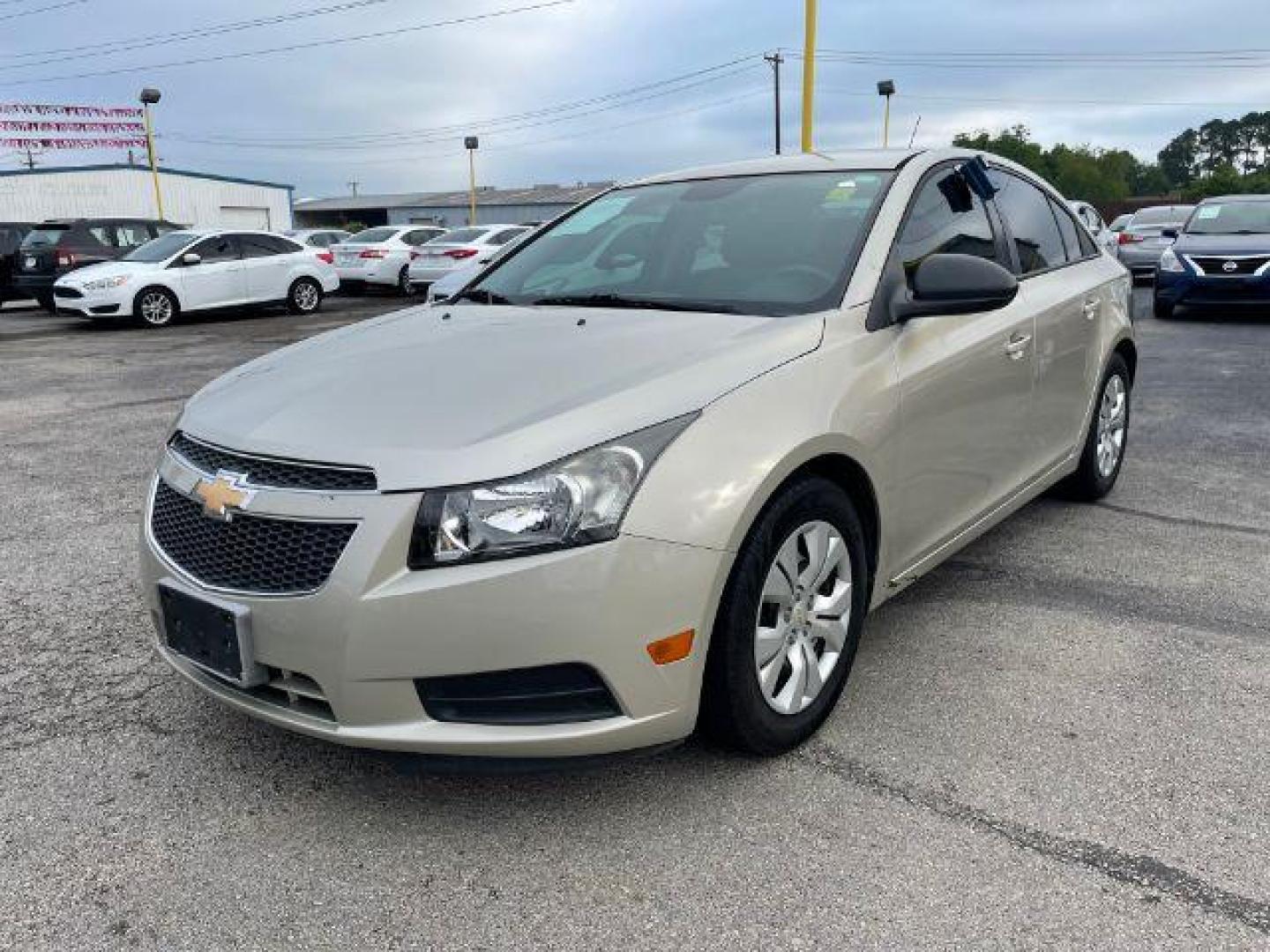 2014 GOLD Chevrolet Cruze LS Auto (1G1PA5SH6E7) with an 1.8L L4 DOHC 16V FFV engine, 6-Speed Automatic transmission, located at 2715 W Pioneer Pkwy, Arlington, TX, 76013, (817) 265-9009, 32.710262, -97.153236 - Photo#2