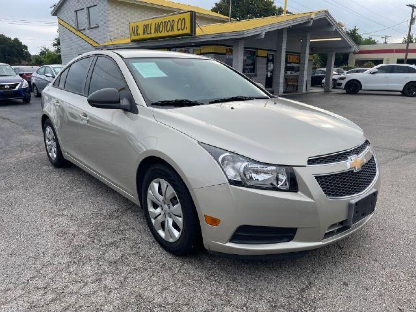 2014 GOLD Chevrolet Cruze LS Auto (1G1PA5SH6E7) with an 1.8L L4 DOHC 16V FFV engine, 6-Speed Automatic transmission, located at 2715 W Pioneer Pkwy, Arlington, TX, 76013, (817) 265-9009, 32.710262, -97.153236 - Photo#4