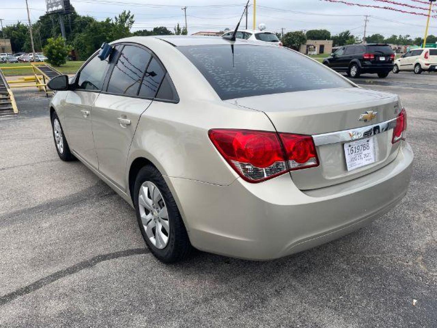 2014 GOLD Chevrolet Cruze LS Auto (1G1PA5SH6E7) with an 1.8L L4 DOHC 16V FFV engine, 6-Speed Automatic transmission, located at 2715 W Pioneer Pkwy, Arlington, TX, 76013, (817) 265-9009, 32.710262, -97.153236 - Photo#8