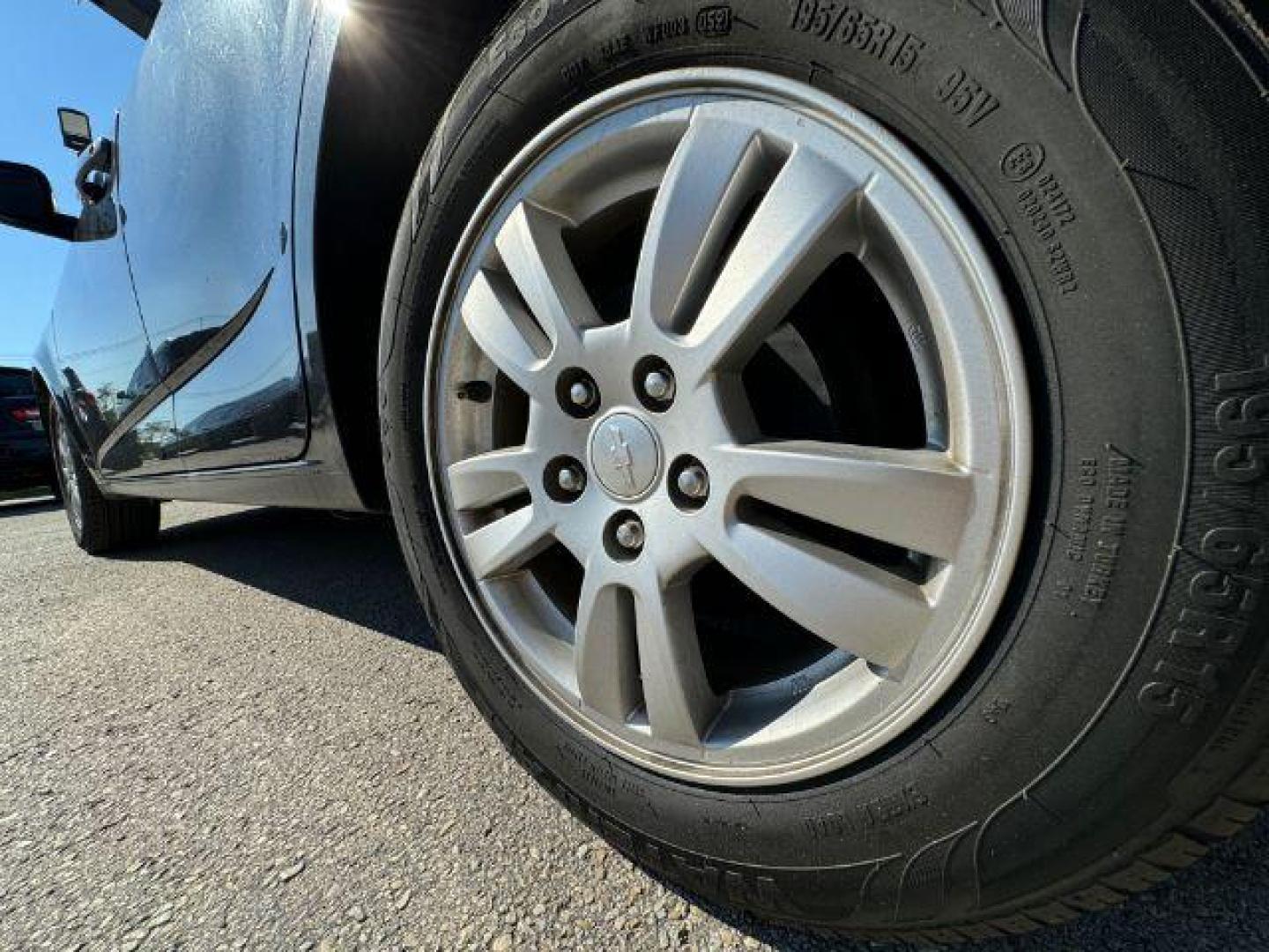 2013 BLACK Chevrolet Sonic LT Auto Sedan (1G1JC5SB1D4) with an 1.4L L4 DOHC 24V TUR engine, 6-Speed Automatic transmission, located at 2715 W Pioneer Pkwy, Arlington, TX, 76013, (817) 265-9009, 32.710262, -97.153236 - Photo#11