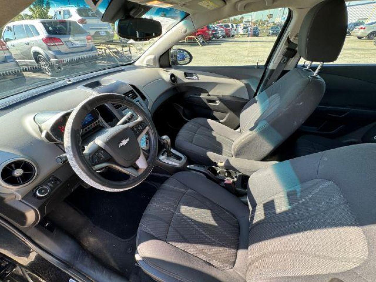 2013 BLACK Chevrolet Sonic LT Auto Sedan (1G1JC5SB1D4) with an 1.4L L4 DOHC 24V TUR engine, 6-Speed Automatic transmission, located at 2715 W Pioneer Pkwy, Arlington, TX, 76013, (817) 265-9009, 32.710262, -97.153236 - Photo#15