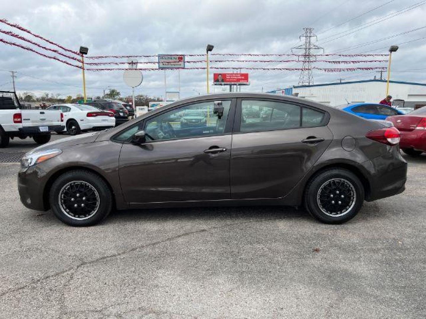 2017 BROWN Kia Forte LX 6A (3KPFK4A77HE) with an 2.0L L4 DOHC 16V engine, 6-Speed Automatic transmission, located at 2715 W Pioneer Pkwy, Arlington, TX, 76013, (817) 265-9009, 32.710262, -97.153236 - Photo#1