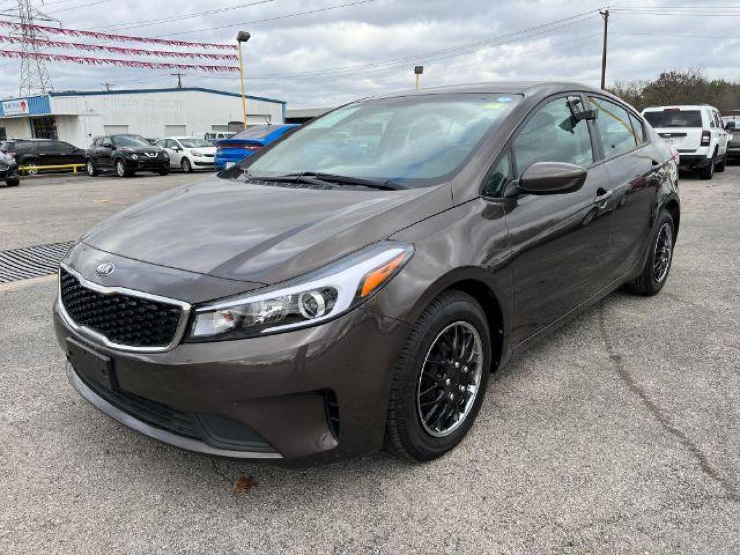 2017 BROWN Kia Forte LX 6A (3KPFK4A77HE) with an 2.0L L4 DOHC 16V engine, 6-Speed Automatic transmission, located at 2715 W Pioneer Pkwy, Arlington, TX, 76013, (817) 265-9009, 32.710262, -97.153236 - Photo#2