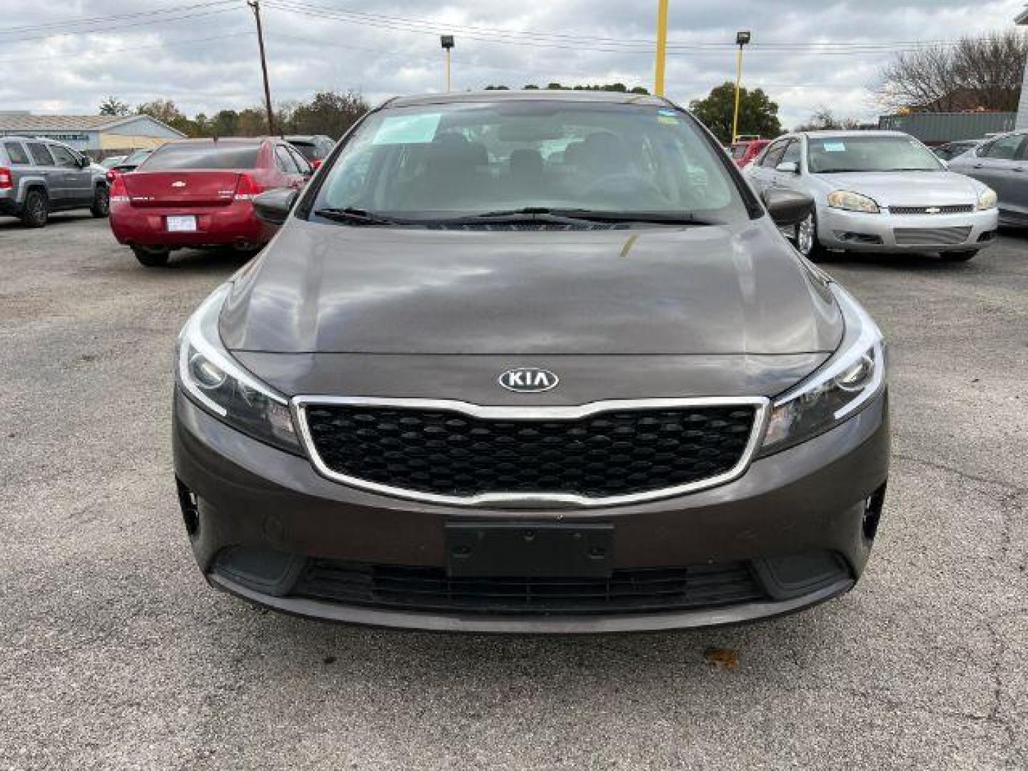 2017 BROWN Kia Forte LX 6A (3KPFK4A77HE) with an 2.0L L4 DOHC 16V engine, 6-Speed Automatic transmission, located at 2715 W Pioneer Pkwy, Arlington, TX, 76013, (817) 265-9009, 32.710262, -97.153236 - Photo#3