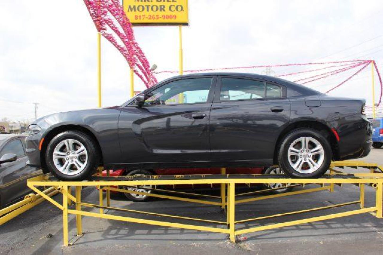 2016 BLACK Dodge Charger SE (2C3CDXBG8GH) with an 3.6L V6 DOHC 24V engine, 8-Speed Automatic transmission, located at 2715 W Pioneer Pkwy, Arlington, TX, 76013, (817) 265-9009, 32.710262, -97.153236 - Photo#1