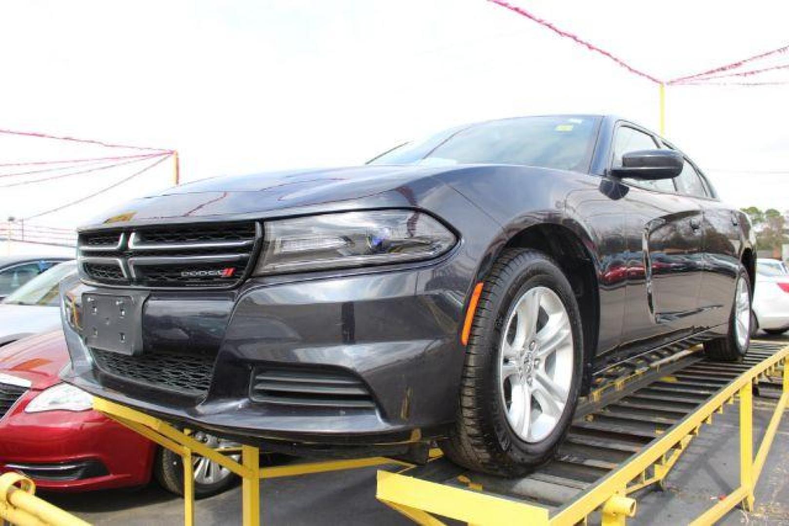 2016 BLACK Dodge Charger SE (2C3CDXBG8GH) with an 3.6L V6 DOHC 24V engine, 8-Speed Automatic transmission, located at 2715 W Pioneer Pkwy, Arlington, TX, 76013, (817) 265-9009, 32.710262, -97.153236 - Photo#2