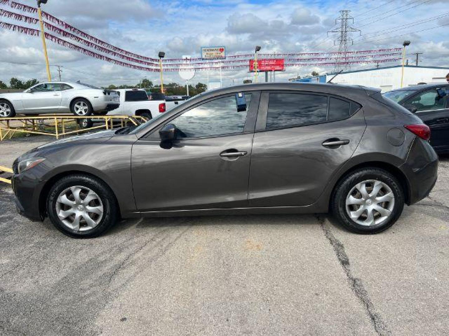 2016 GRAY Mazda MAZDA3 SEDAN 4-DR (JM1BM1J73G1) with an 2.0L L4 DOHC 16V engine, 6-Speed Automatic transmission, located at 2715 W Pioneer Pkwy, Arlington, TX, 76013, (817) 265-9009, 32.710262, -97.153236 - Photo#1