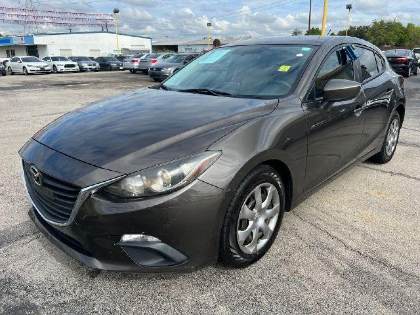 2016 GRAY Mazda MAZDA3 SEDAN 4-DR (JM1BM1J73G1) with an 2.0L L4 DOHC 16V engine, 6-Speed Automatic transmission, located at 2715 W Pioneer Pkwy, Arlington, TX, 76013, (817) 265-9009, 32.710262, -97.153236 - Photo#2