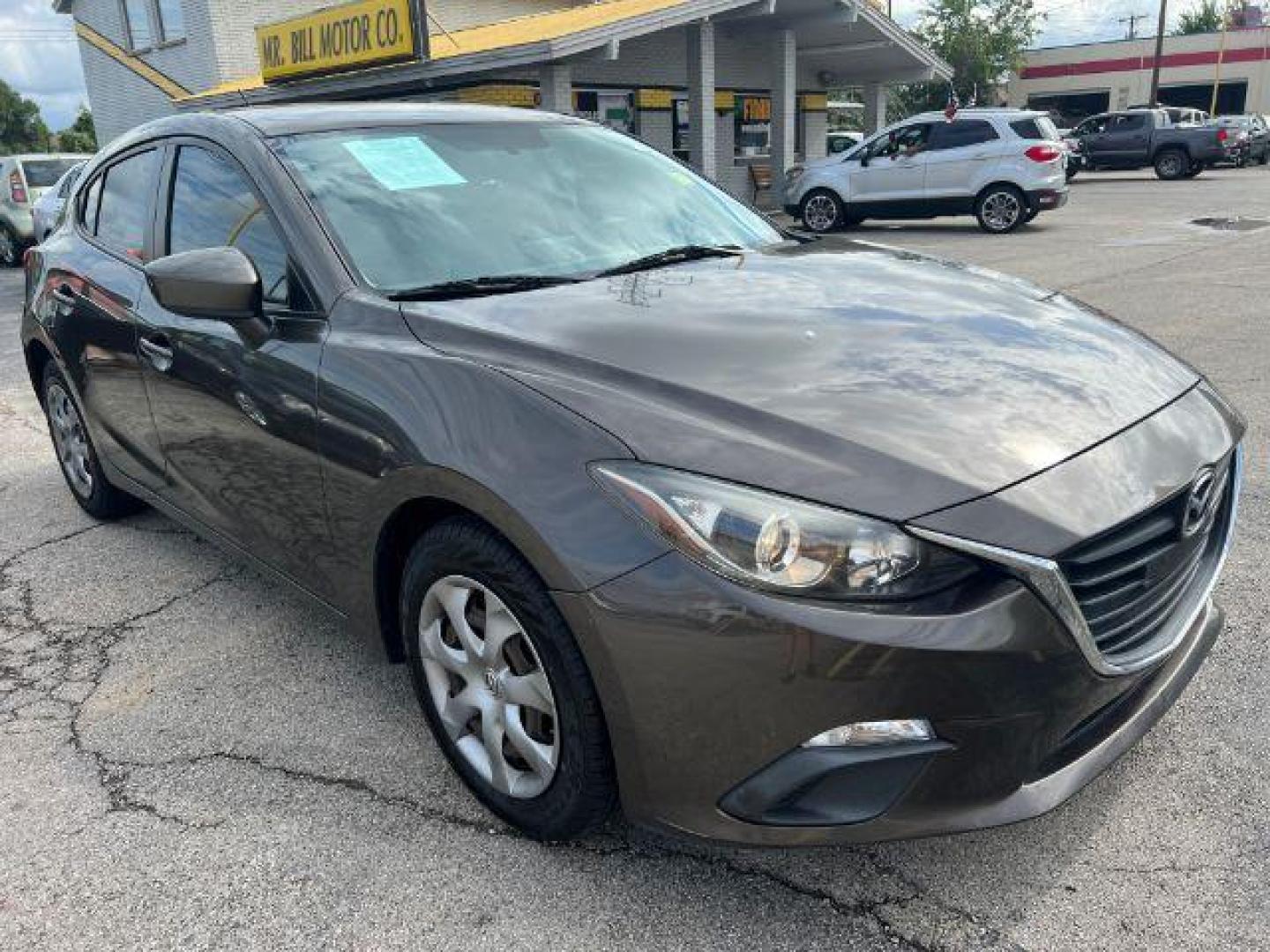 2016 GRAY Mazda MAZDA3 SEDAN 4-DR (JM1BM1J73G1) with an 2.0L L4 DOHC 16V engine, 6-Speed Automatic transmission, located at 2715 W Pioneer Pkwy, Arlington, TX, 76013, (817) 265-9009, 32.710262, -97.153236 - Photo#4