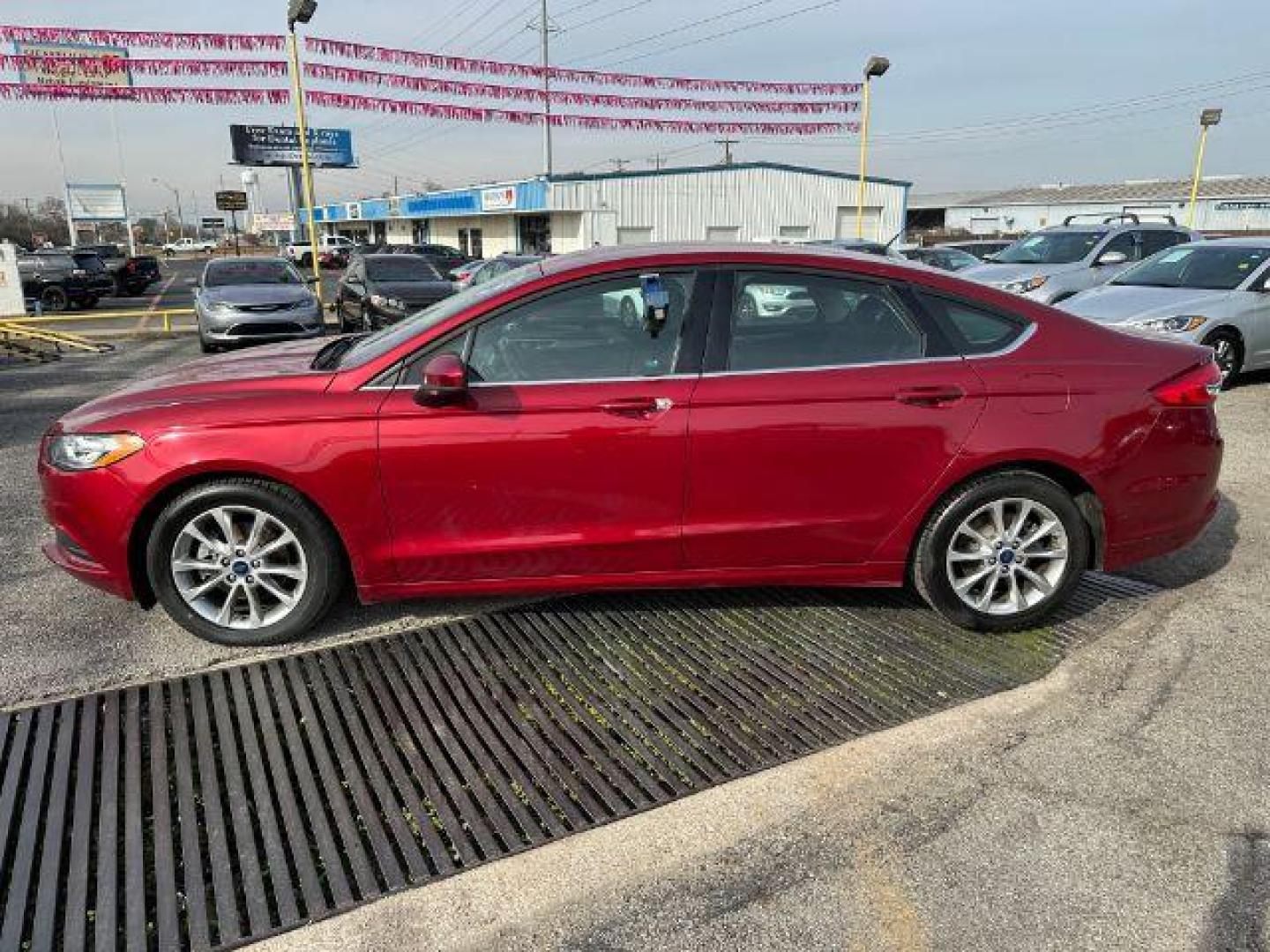 2017 RED Ford FUS SE (3FA6P0HD0HR) with an 1.5L L4 DOHC 16V engine, 6-Speed Automatic transmission, located at 2715 W Pioneer Pkwy, Arlington, TX, 76013, (817) 265-9009, 32.710262, -97.153236 - Photo#1