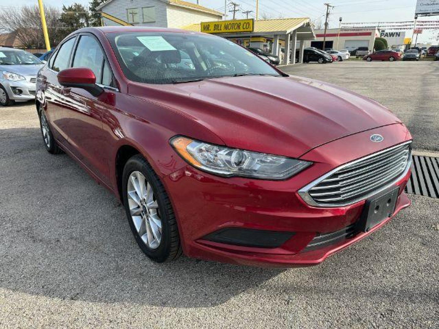 2017 RED Ford FUS SE (3FA6P0HD0HR) with an 1.5L L4 DOHC 16V engine, 6-Speed Automatic transmission, located at 2715 W Pioneer Pkwy, Arlington, TX, 76013, (817) 265-9009, 32.710262, -97.153236 - Photo#4