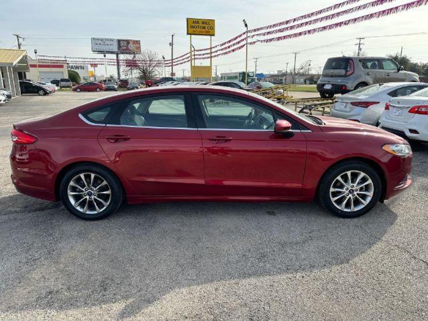 2017 RED Ford FUS SE (3FA6P0HD0HR) with an 1.5L L4 DOHC 16V engine, 6-Speed Automatic transmission, located at 2715 W Pioneer Pkwy, Arlington, TX, 76013, (817) 265-9009, 32.710262, -97.153236 - Photo#5