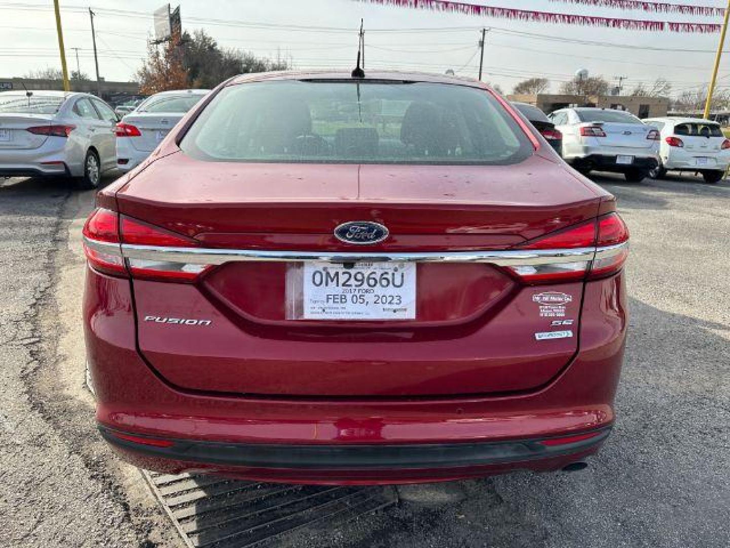 2017 RED Ford FUS SE (3FA6P0HD0HR) with an 1.5L L4 DOHC 16V engine, 6-Speed Automatic transmission, located at 2715 W Pioneer Pkwy, Arlington, TX, 76013, (817) 265-9009, 32.710262, -97.153236 - Photo#7