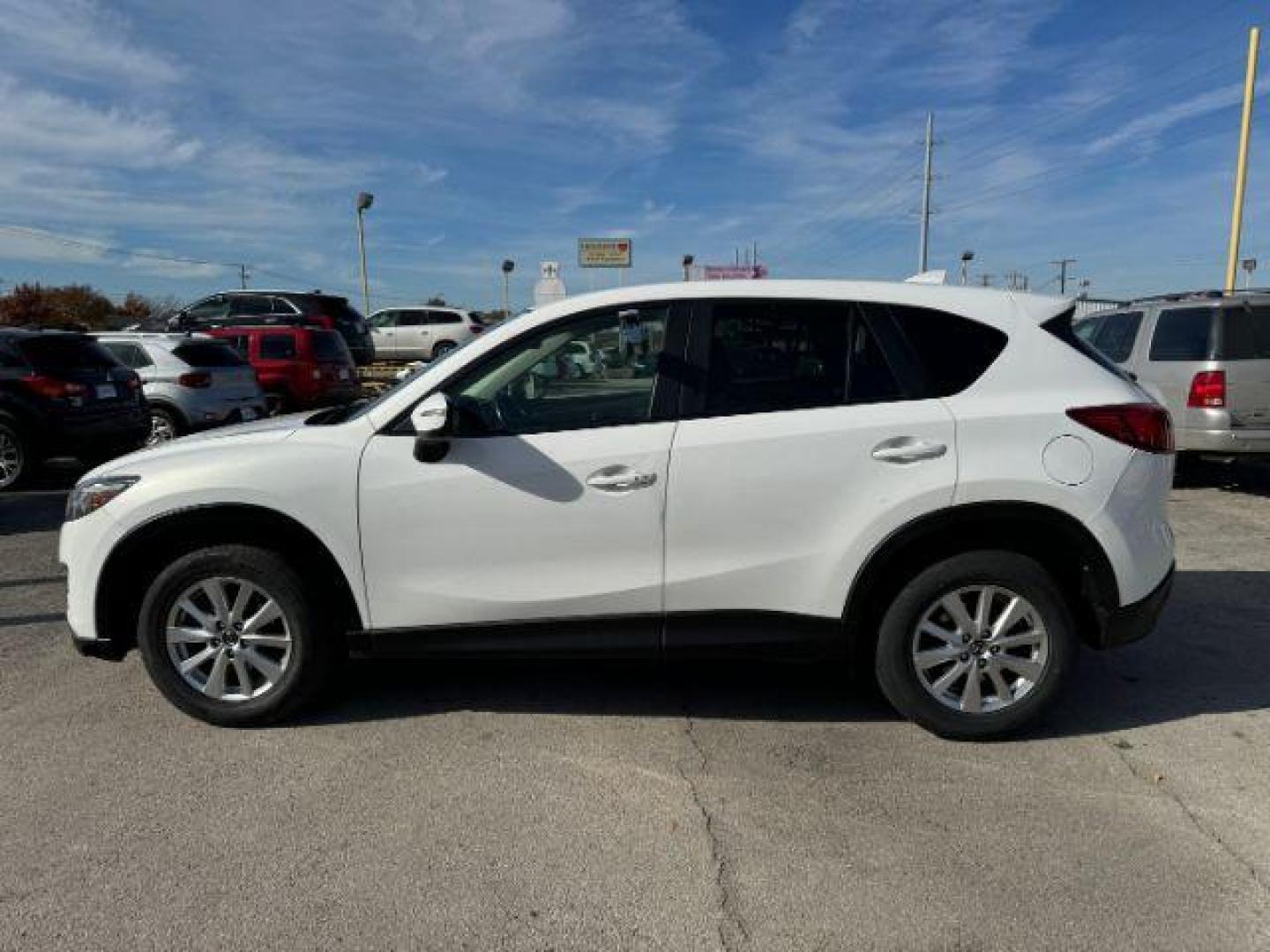 2016 White Mazda CX-5 Touring (JM3KE2CY5G0) with an 2.5L L4 DOHC 16V engine, 6-Speed Automatic transmission, located at 2715 W Pioneer Pkwy, Arlington, TX, 76013, (817) 265-9009, 32.710262, -97.153236 - Photo#1