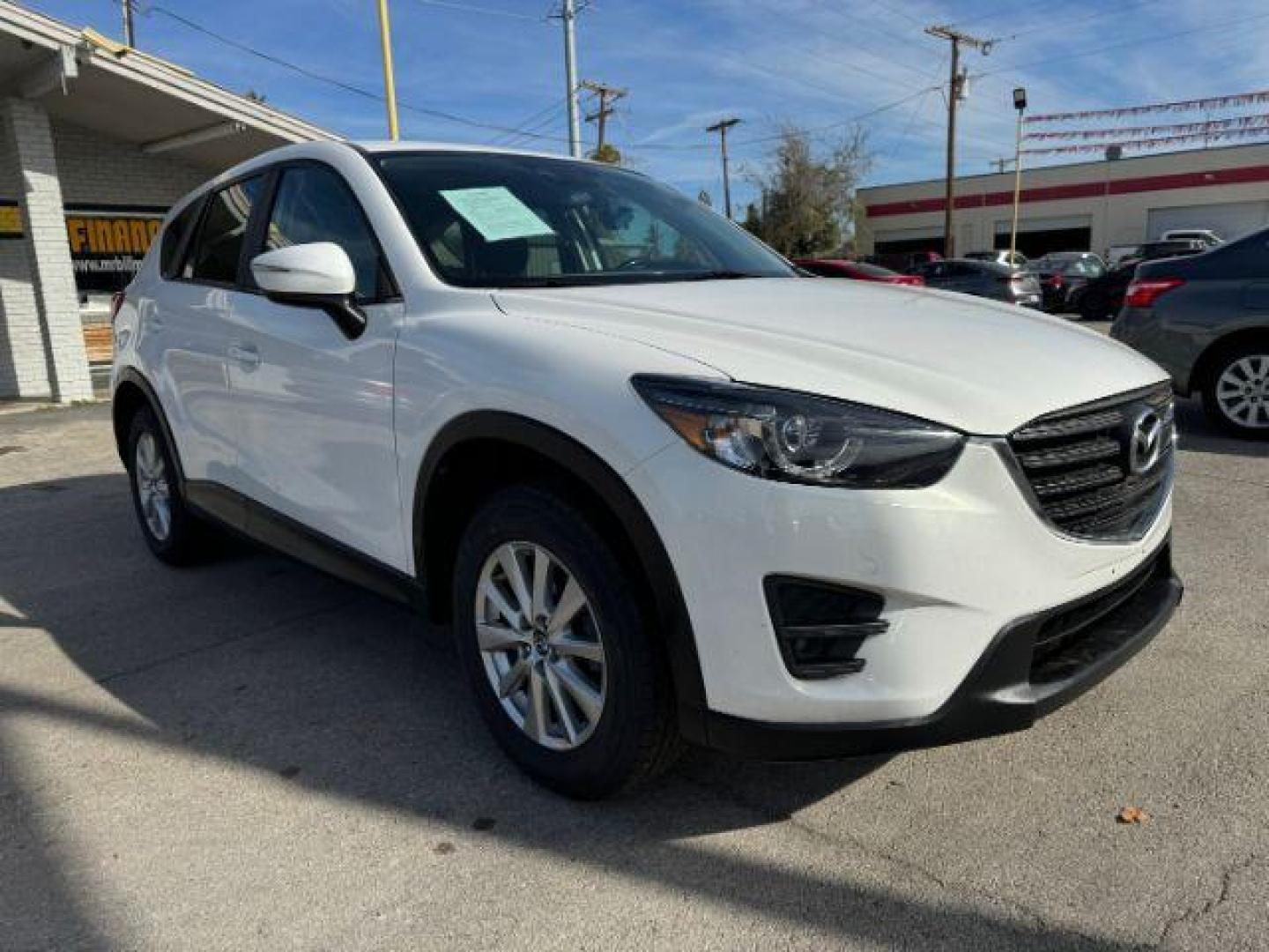 2016 White Mazda CX-5 Touring (JM3KE2CY5G0) with an 2.5L L4 DOHC 16V engine, 6-Speed Automatic transmission, located at 2715 W Pioneer Pkwy, Arlington, TX, 76013, (817) 265-9009, 32.710262, -97.153236 - Photo#4