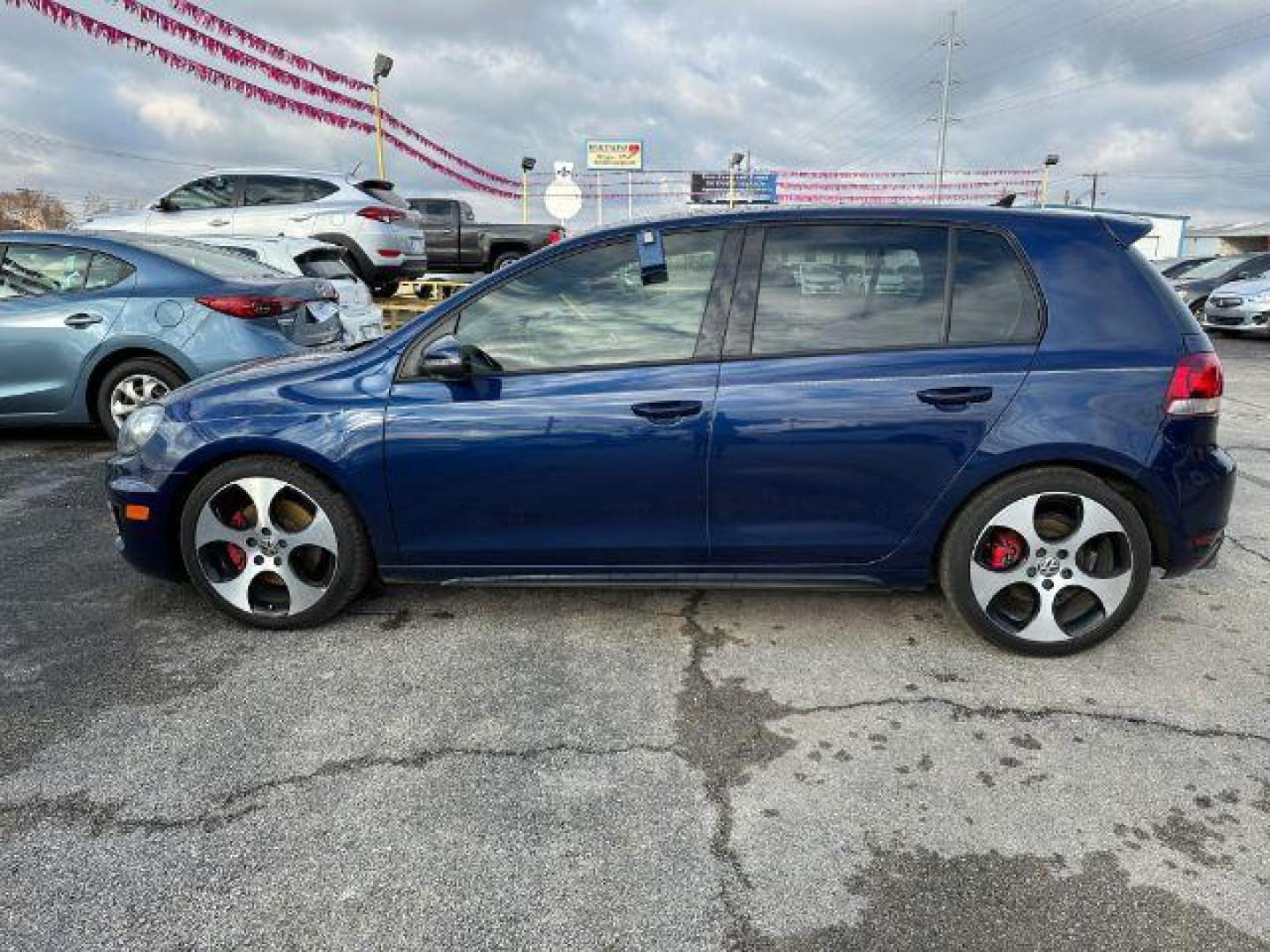 2012 BLUE Volkswagen GTI 4-door (WVWHV7AJ3CW) with an 2.0L L4 DOHC 16V TUR engine, located at 2715 W Pioneer Pkwy, Arlington, TX, 76013, (817) 265-9009, 32.710262, -97.153236 - Photo#1