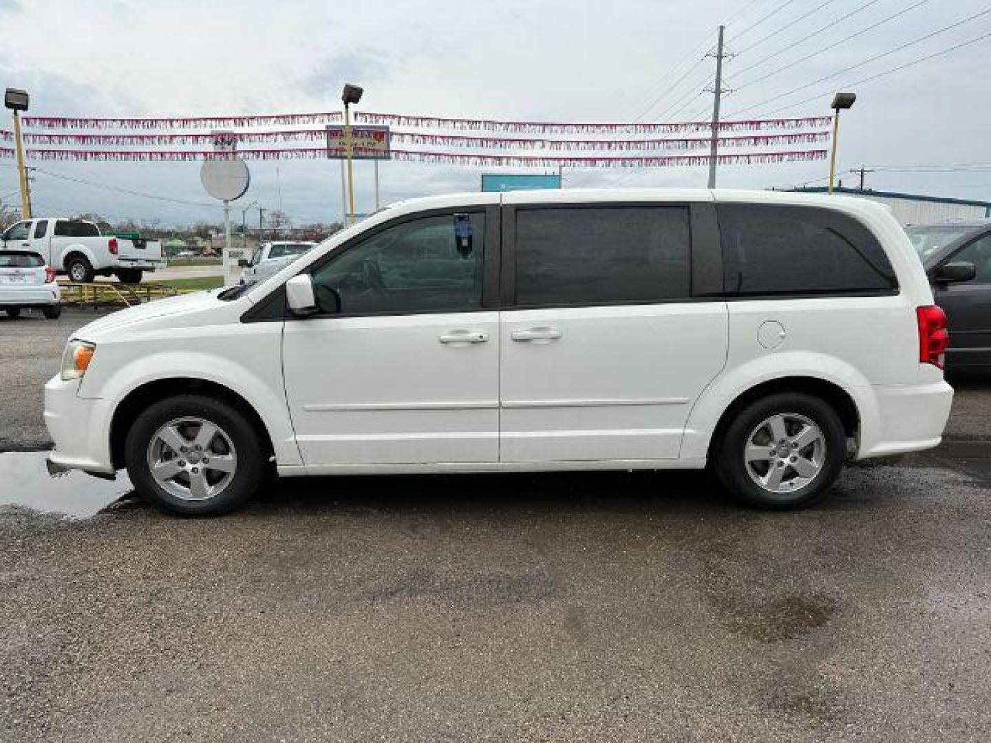 2012 Stone White Dodge Grand Caravan SXT (2C4RDGCG6CR) with an 3.6L V6 DOHC 24V engine, 6-Speed Automatic transmission, located at 2715 W Pioneer Pkwy, Arlington, TX, 76013, (817) 265-9009, 32.710262, -97.153236 - Photo#1