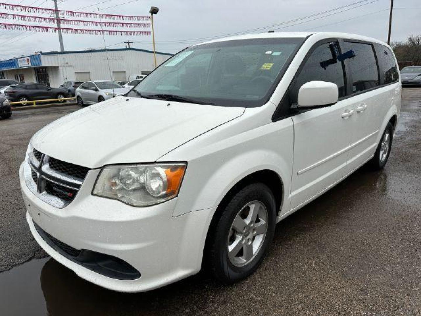 2012 Stone White Dodge Grand Caravan SXT (2C4RDGCG6CR) with an 3.6L V6 DOHC 24V engine, 6-Speed Automatic transmission, located at 2715 W Pioneer Pkwy, Arlington, TX, 76013, (817) 265-9009, 32.710262, -97.153236 - Photo#2