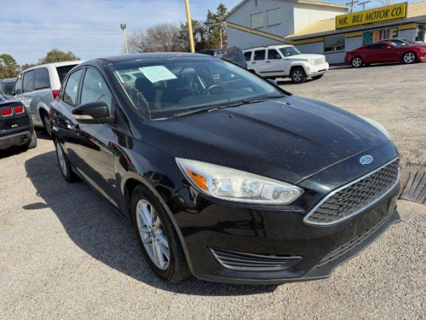 2015 BLACK Ford Focus SE Sedan (1FADP3F20FL) with an 2.0L L4 DOHC 16V engine, located at 2715 W Pioneer Pkwy, Arlington, TX, 76013, (817) 265-9009, 32.710262, -97.153236 - Photo#5