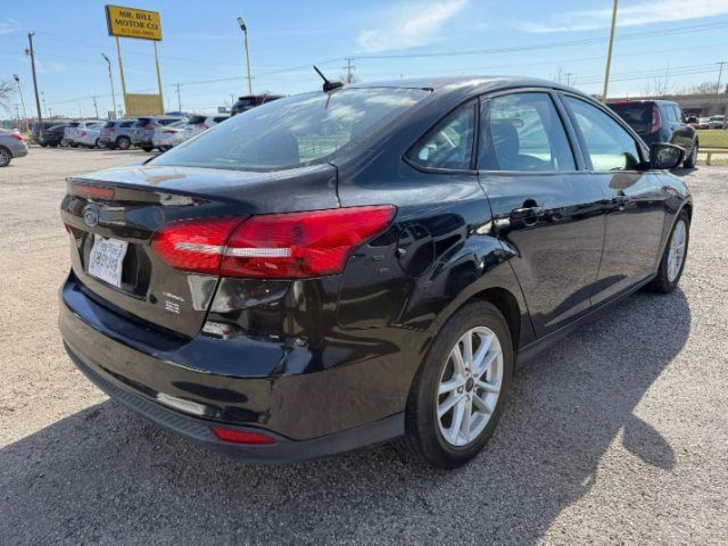 2015 BLACK Ford Focus SE Sedan (1FADP3F20FL) with an 2.0L L4 DOHC 16V engine, located at 2715 W Pioneer Pkwy, Arlington, TX, 76013, (817) 265-9009, 32.710262, -97.153236 - Photo#6