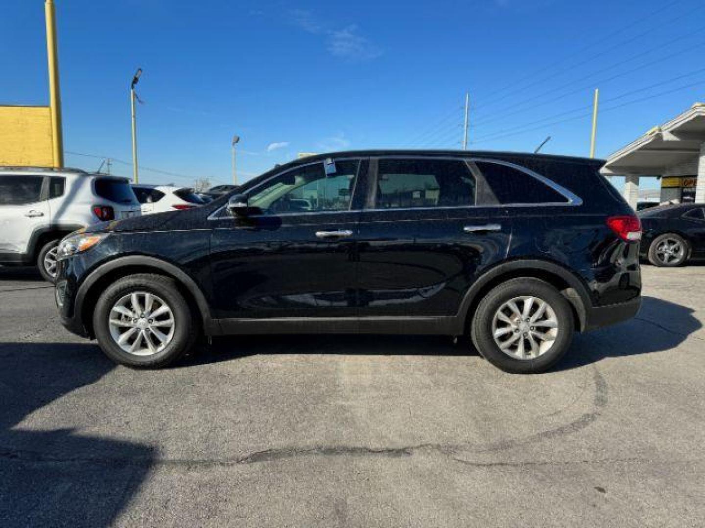 2016 BLACK Kia Sorento L 2WD (5XYPG4A31GG) with an 2.4L L4 DOHC 16V engine, 6-Speed Automatic transmission, located at 2715 W Pioneer Pkwy, Arlington, TX, 76013, (817) 265-9009, 32.710262, -97.153236 - Photo#2