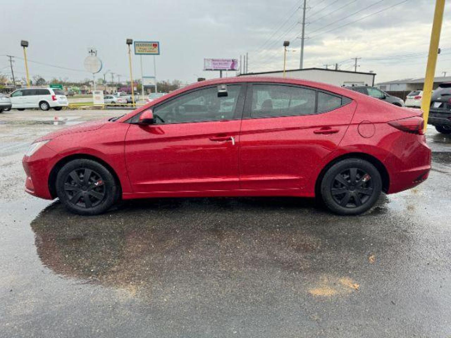 2019 Red Hyundai Elantra SE 6AT (KMHD74LF4KU) with an 1.8L L4 DOHC 16V engine, 6-Speed Automatic transmission, located at 2715 W Pioneer Pkwy, Arlington, TX, 76013, (817) 265-9009, 32.710262, -97.153236 - Photo#2