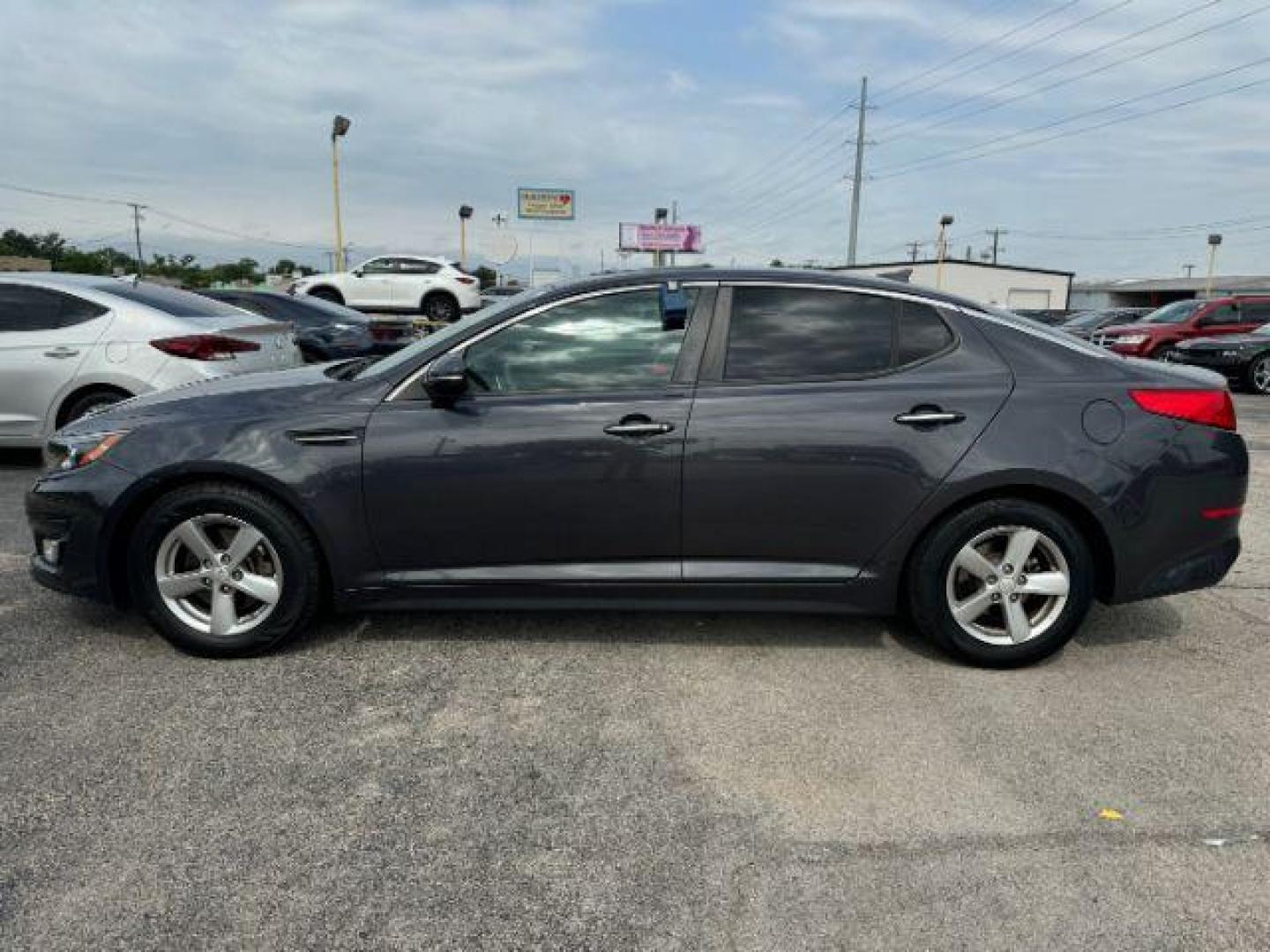 2015 GRAY Kia Optima LX (5XXGM4A76FG) with an 2.4L L4 DOHC 16V engine, 6-Speed Automatic transmission, located at 2715 W Pioneer Pkwy, Arlington, TX, 76013, (817) 265-9009, 32.710262, -97.153236 - Photo#2