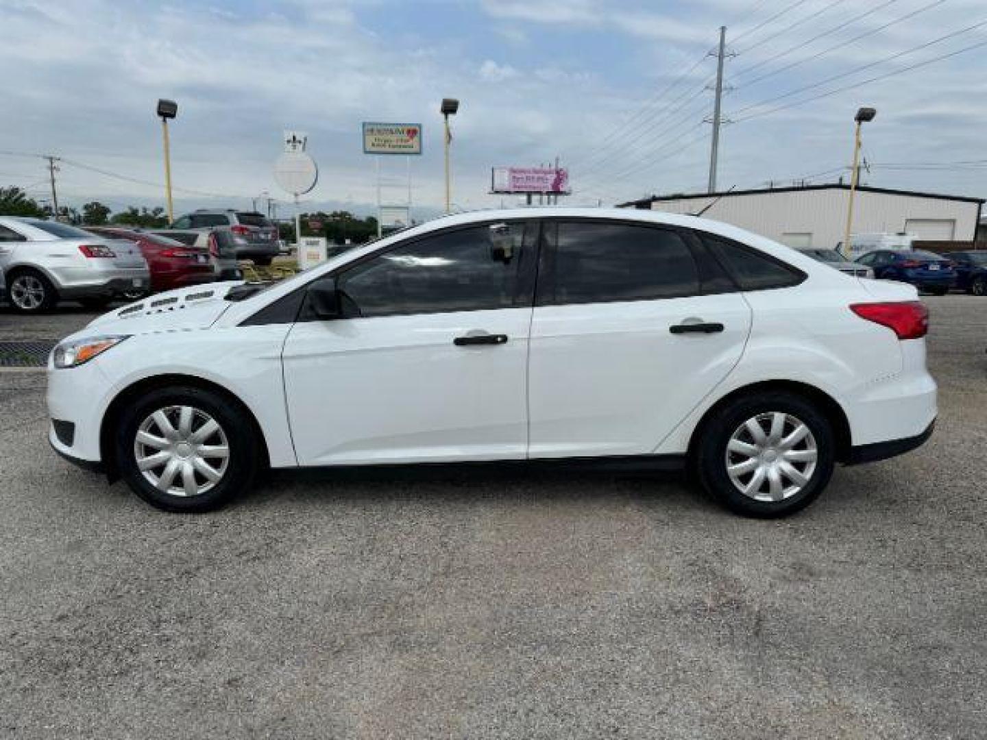 2018 WHITE Ford Focus S Sedan (1FADP3E2XJL) with an 2.0L L4 DOHC 16V engine, stand transmission, located at 2715 W Pioneer Pkwy, Arlington, TX, 76013, (817) 265-9009, 32.710262, -97.153236 - Photo#2