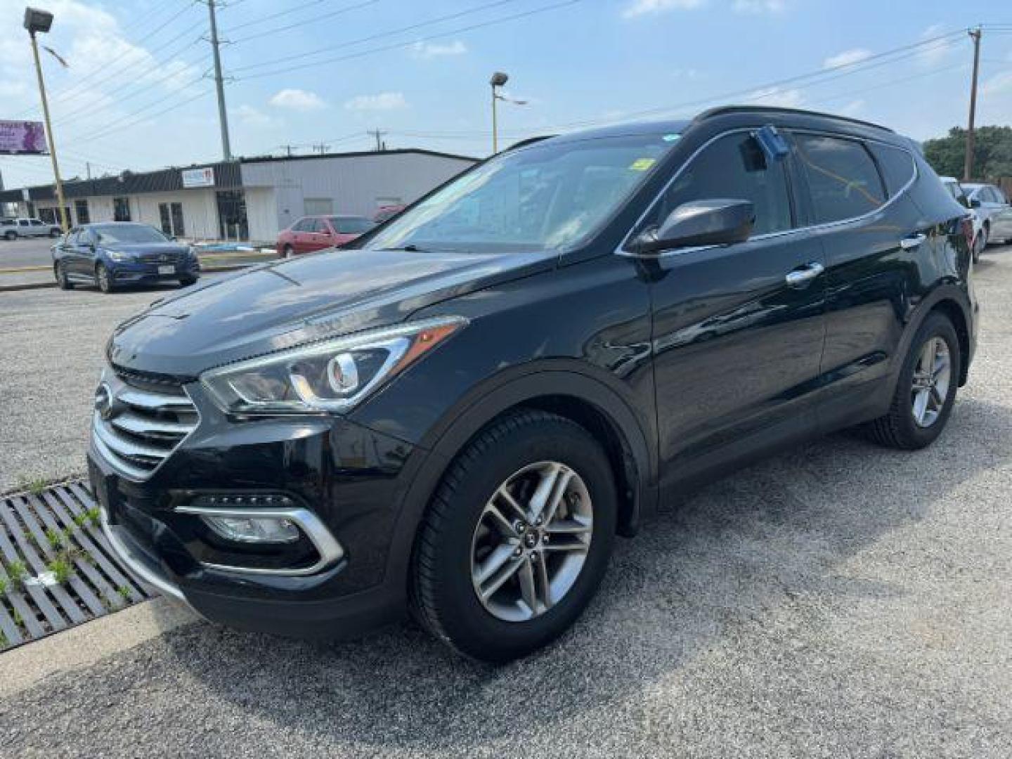 2017 BLACK Hyundai Santa Fe Sport 2.4 FWD (5XYZU3LB7HG) with an 2.4L L4 DOHC 16V engine, 6-Speed Automatic transmission, located at 2715 W Pioneer Pkwy, Arlington, TX, 76013, (817) 265-9009, 32.710262, -97.153236 - Photo#3