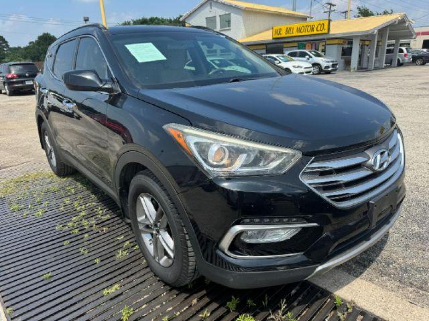 2017 BLACK Hyundai Santa Fe Sport 2.4 FWD (5XYZU3LB7HG) with an 2.4L L4 DOHC 16V engine, 6-Speed Automatic transmission, located at 2715 W Pioneer Pkwy, Arlington, TX, 76013, (817) 265-9009, 32.710262, -97.153236 - Photo#5