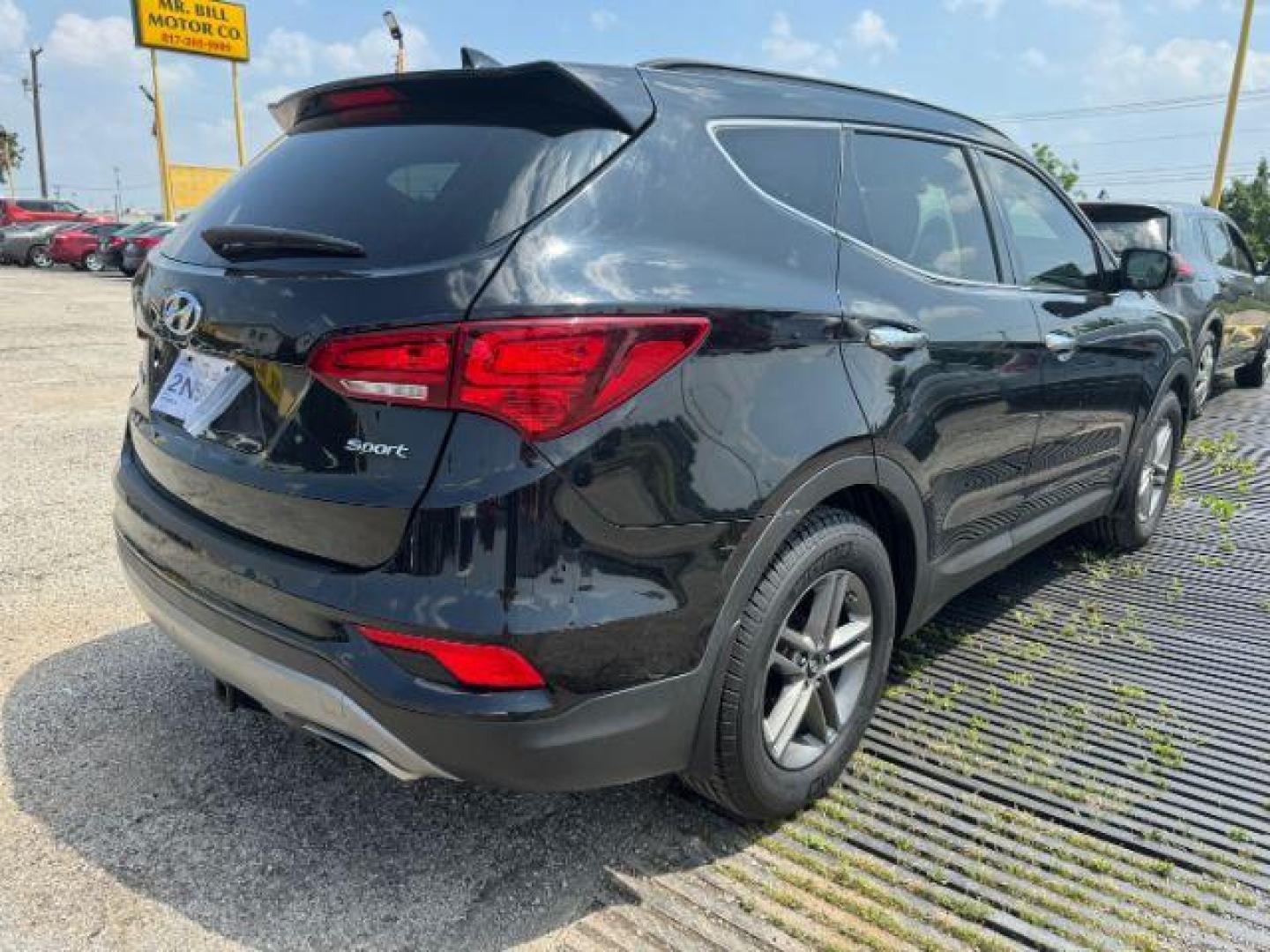 2017 BLACK Hyundai Santa Fe Sport 2.4 FWD (5XYZU3LB7HG) with an 2.4L L4 DOHC 16V engine, 6-Speed Automatic transmission, located at 2715 W Pioneer Pkwy, Arlington, TX, 76013, (817) 265-9009, 32.710262, -97.153236 - Photo#6