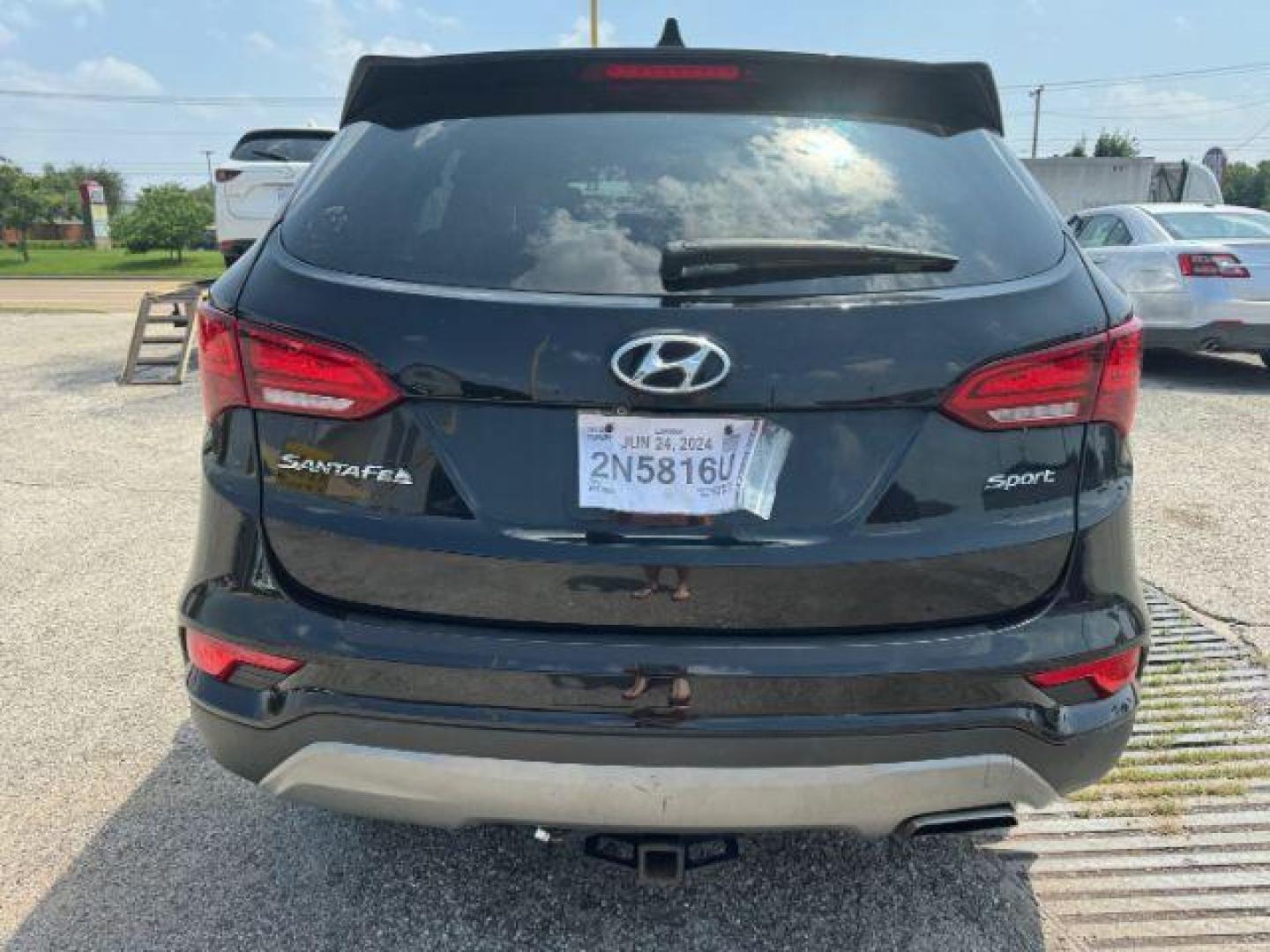 2017 BLACK Hyundai Santa Fe Sport 2.4 FWD (5XYZU3LB7HG) with an 2.4L L4 DOHC 16V engine, 6-Speed Automatic transmission, located at 2715 W Pioneer Pkwy, Arlington, TX, 76013, (817) 265-9009, 32.710262, -97.153236 - Photo#7