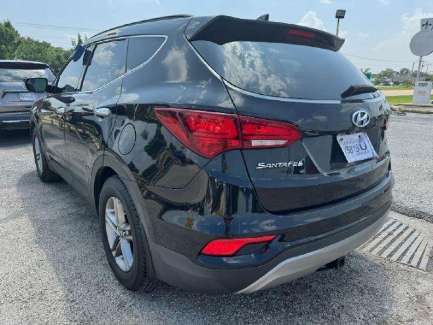 2017 BLACK Hyundai Santa Fe Sport 2.4 FWD (5XYZU3LB7HG) with an 2.4L L4 DOHC 16V engine, 6-Speed Automatic transmission, located at 2715 W Pioneer Pkwy, Arlington, TX, 76013, (817) 265-9009, 32.710262, -97.153236 - Photo#8