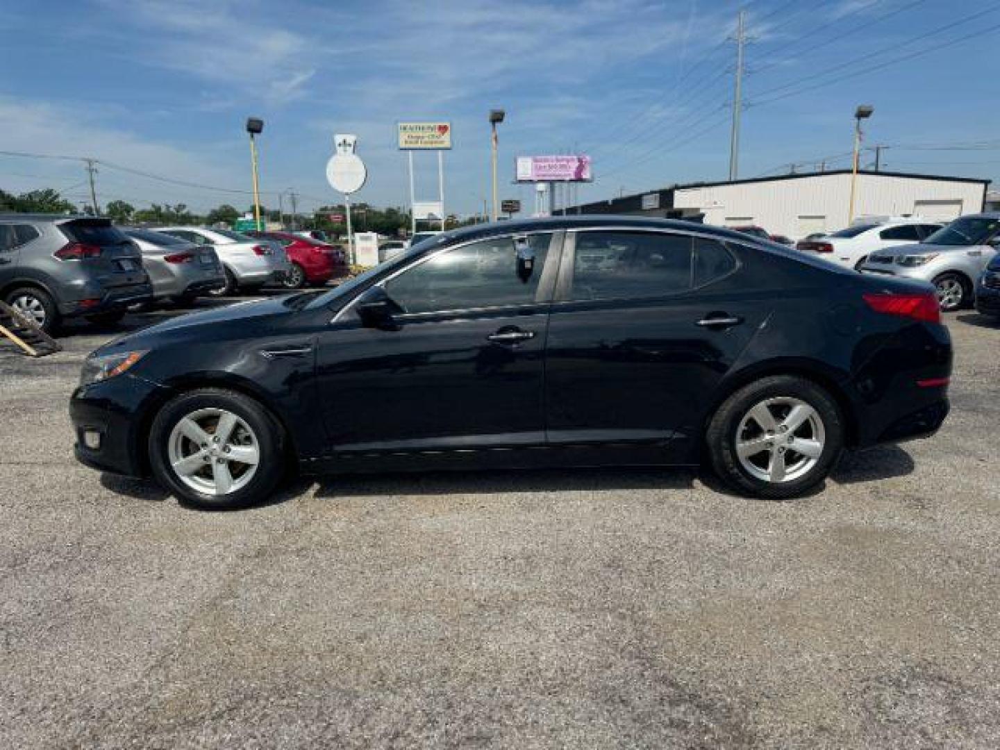 2015 BLACK Kia Optima LX (KNAGM4A70F5) with an 2.4L L4 DOHC 16V engine, 6-Speed Automatic transmission, located at 2715 W Pioneer Pkwy, Arlington, TX, 76013, (817) 265-9009, 32.710262, -97.153236 - Photo#2