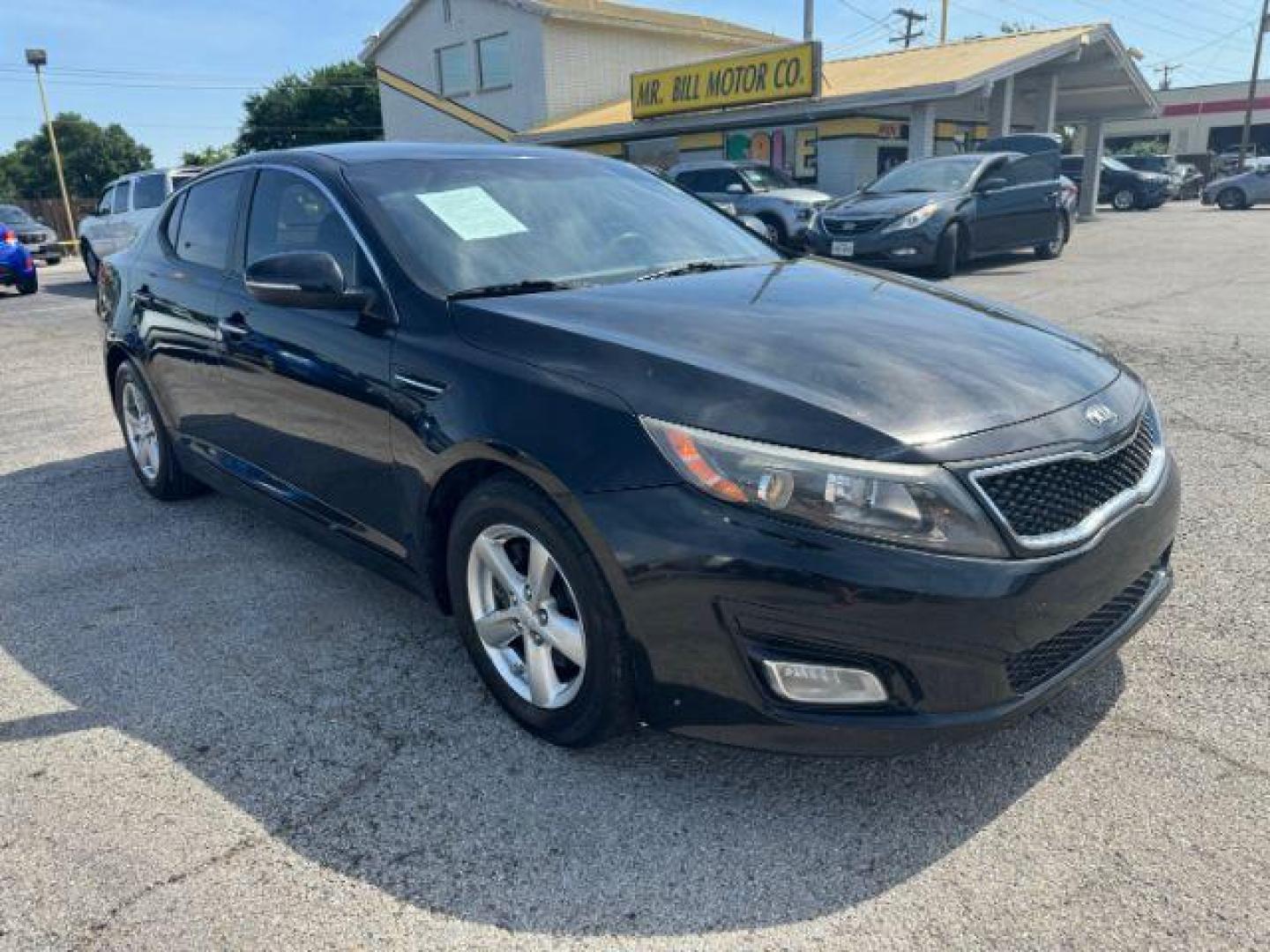 2015 BLACK Kia Optima LX (KNAGM4A70F5) with an 2.4L L4 DOHC 16V engine, 6-Speed Automatic transmission, located at 2715 W Pioneer Pkwy, Arlington, TX, 76013, (817) 265-9009, 32.710262, -97.153236 - Photo#5