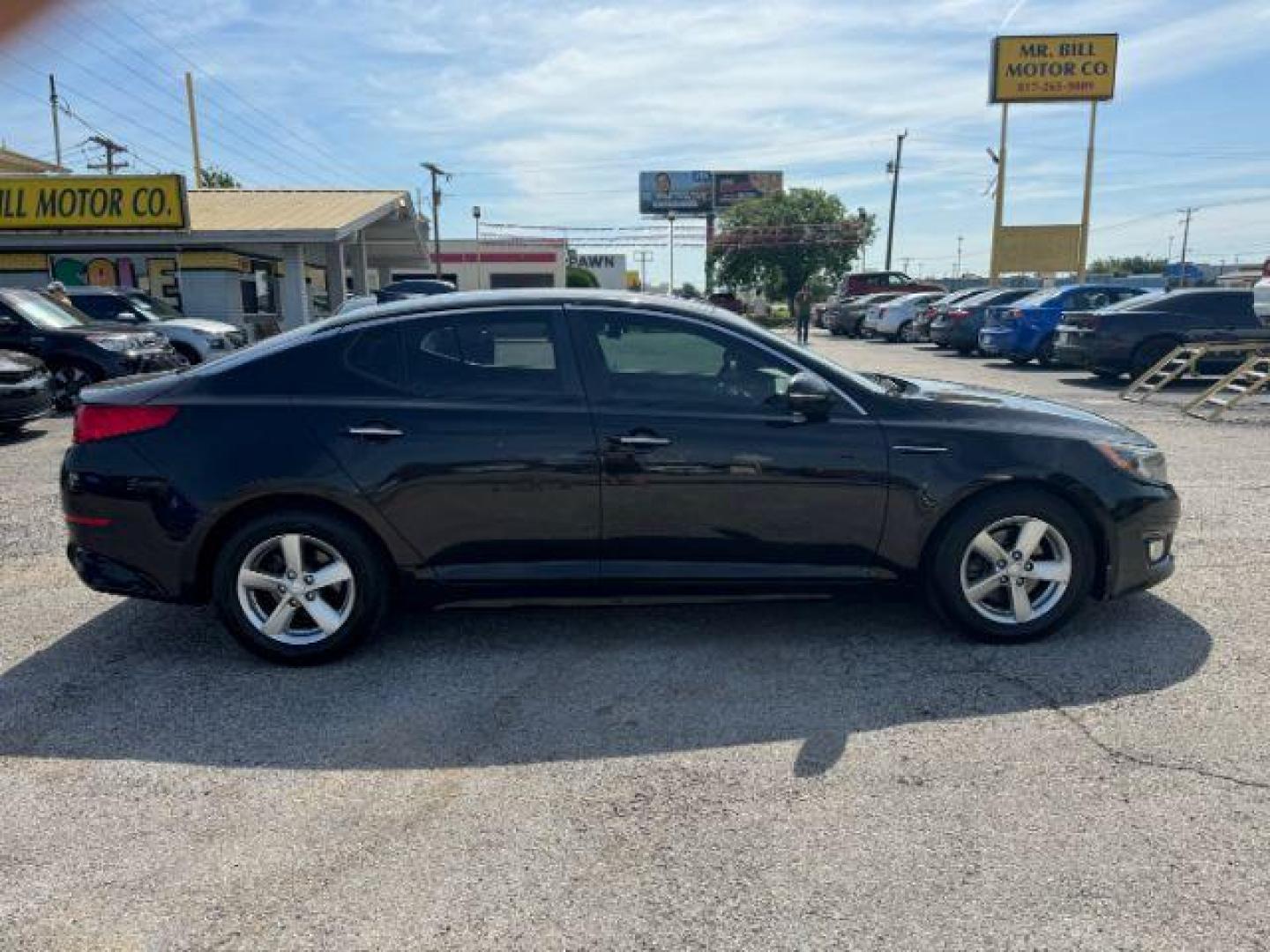 2015 BLACK Kia Optima LX (KNAGM4A70F5) with an 2.4L L4 DOHC 16V engine, 6-Speed Automatic transmission, located at 2715 W Pioneer Pkwy, Arlington, TX, 76013, (817) 265-9009, 32.710262, -97.153236 - Photo#6