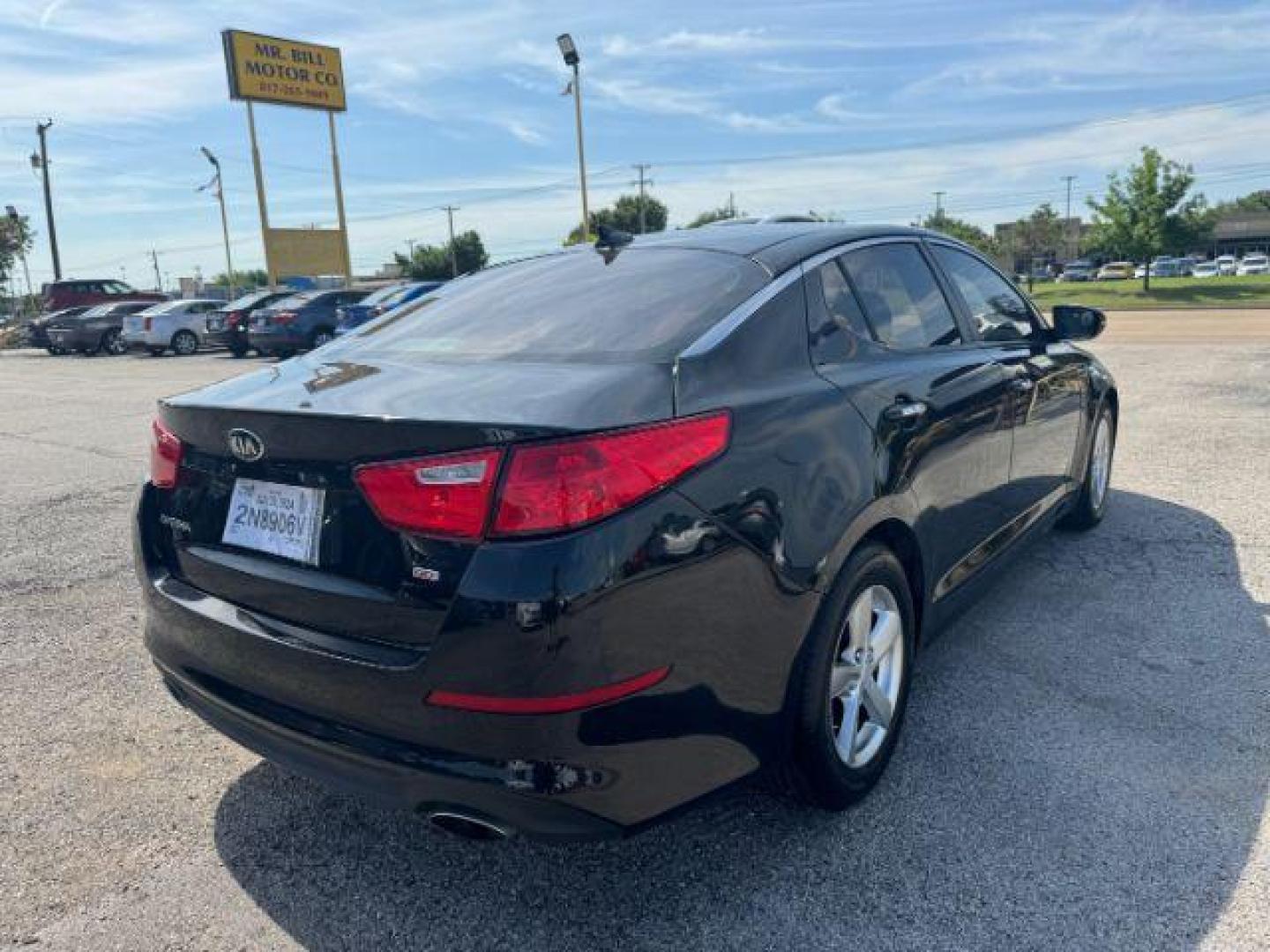 2015 BLACK Kia Optima LX (KNAGM4A70F5) with an 2.4L L4 DOHC 16V engine, 6-Speed Automatic transmission, located at 2715 W Pioneer Pkwy, Arlington, TX, 76013, (817) 265-9009, 32.710262, -97.153236 - Photo#7