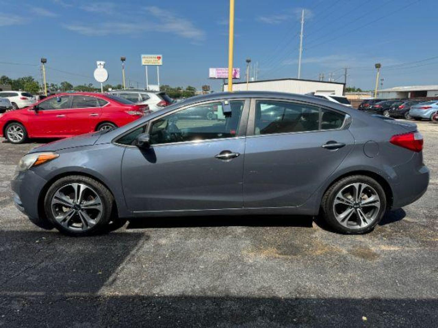 2015 GRAY Kia Forte EX (KNAFX4A85F5) with an 2.0L L4 DOHC 16V engine, 6-Speed Automatic transmission, located at 2715 W Pioneer Pkwy, Arlington, TX, 76013, (817) 265-9009, 32.710262, -97.153236 - Photo#2