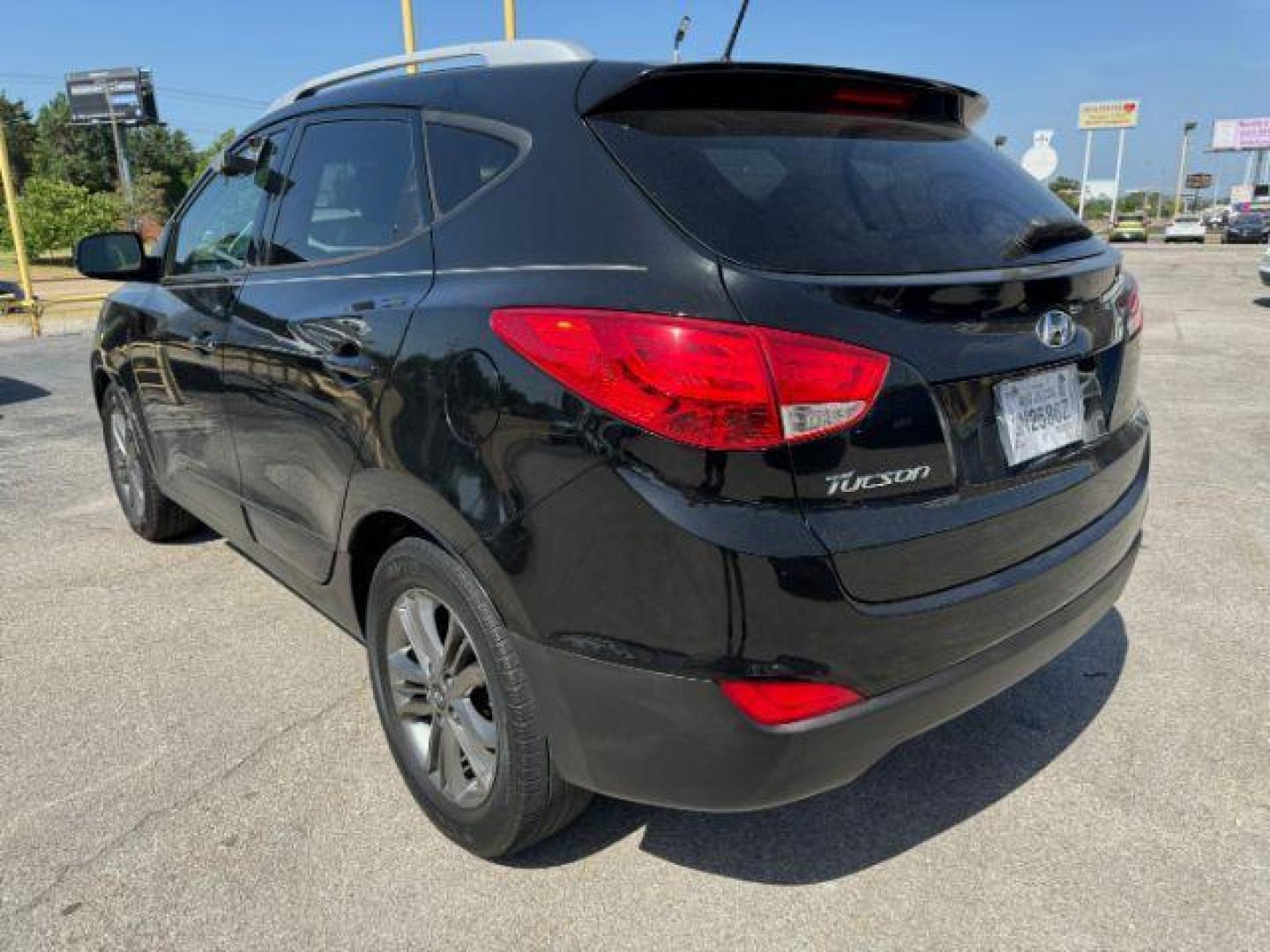 2014 BLACK Hyundai Tucson GLS 2WD (KM8JU3AG8EU) with an 2.4L L4 DOHC 16V engine, 6-Speed Automatic transmission, located at 2715 W Pioneer Pkwy, Arlington, TX, 76013, (817) 265-9009, 32.710262, -97.153236 - Photo#9