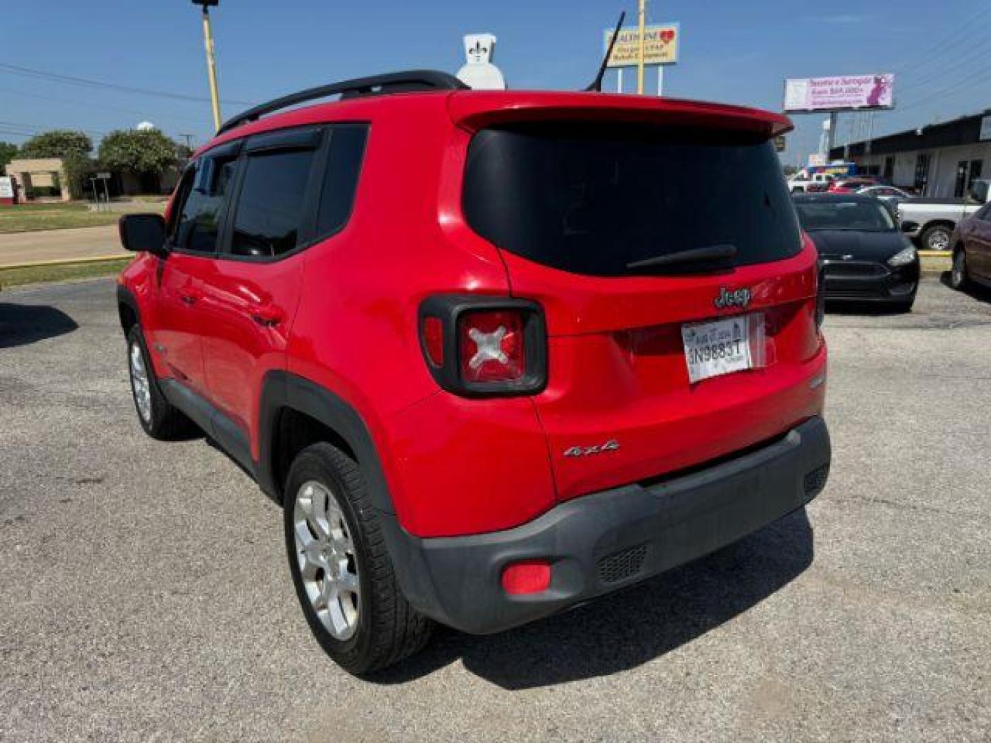 2016 RED Jeep Renegade LL (ZACCJBBT1GP) with an 2.4L L4 DOHC 16V engine, 6-Speed Manual transmission, located at 2715 W Pioneer Pkwy, Arlington, TX, 76013, (817) 265-9009, 32.710262, -97.153236 - Photo#9