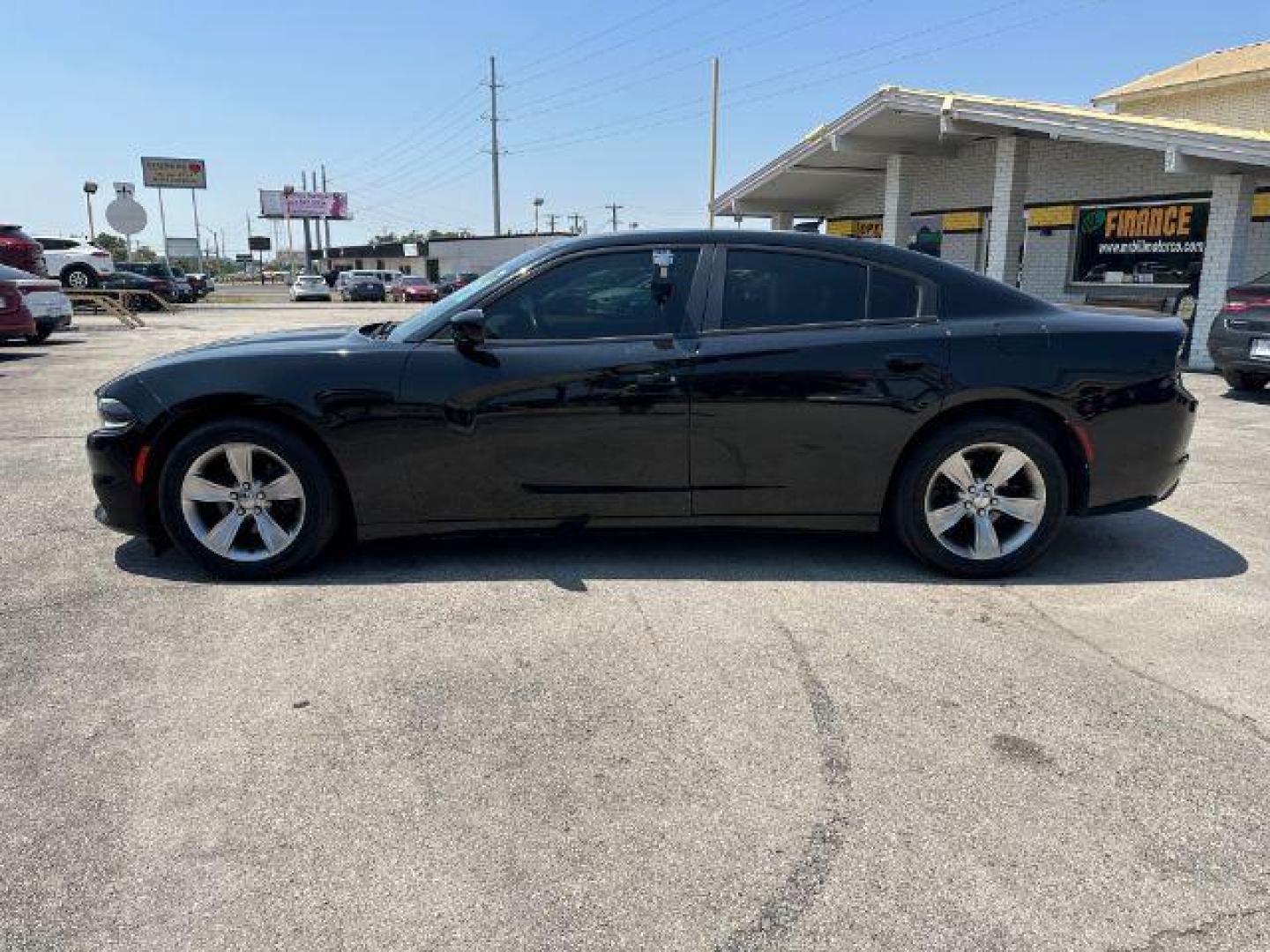 2015 BLACK Dodge Charger SXT (2C3CDXHG5FH) with an 3.6L V6 DOHC 24V engine, 8-Speed Automatic transmission, located at 2715 W Pioneer Pkwy, Arlington, TX, 76013, (817) 265-9009, 32.710262, -97.153236 - Photo#11