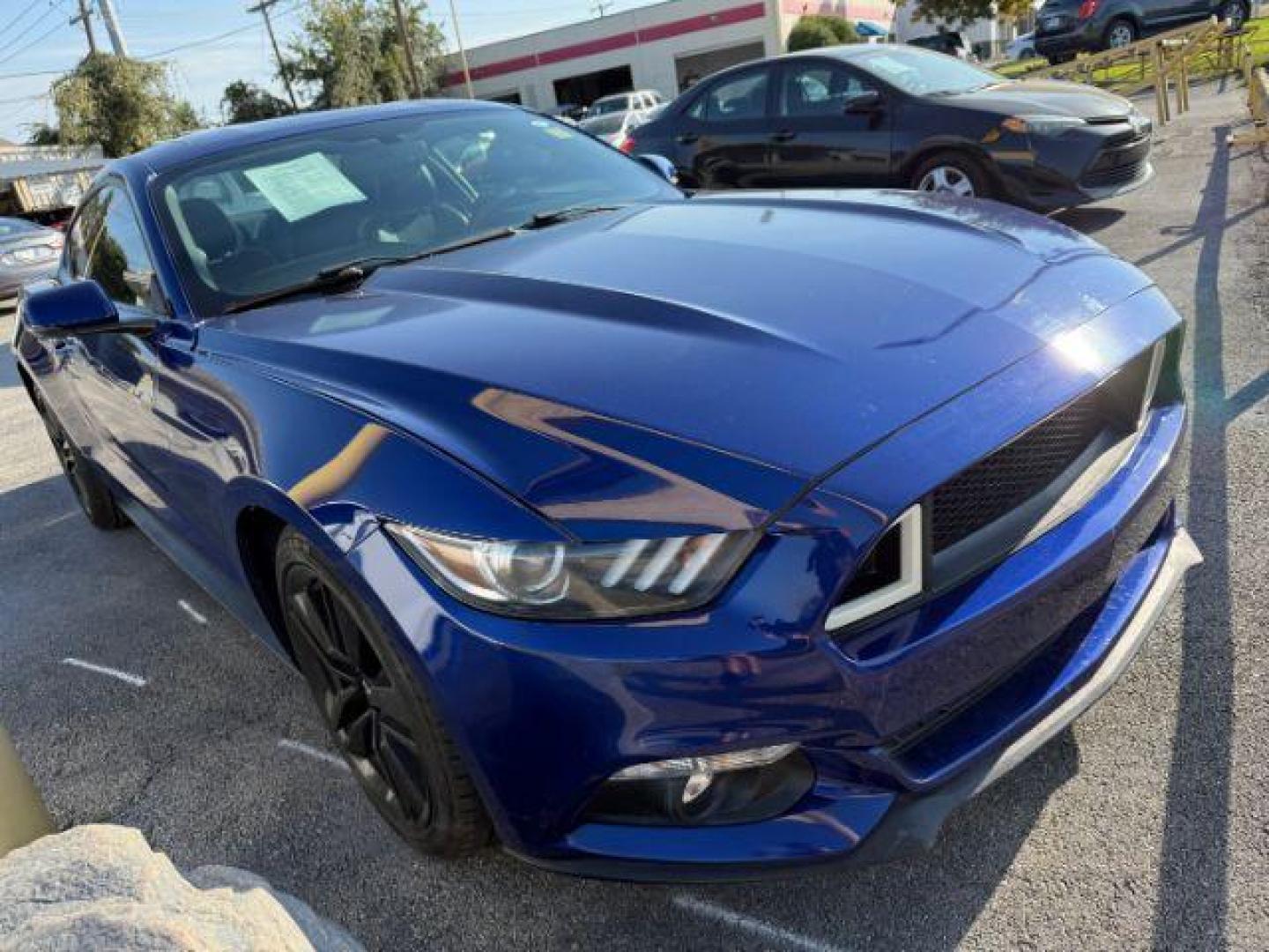 2016 BLUE Ford Mustang EcoBoost Premium Coupe (1FA6P8TH3G5) with an 2.3L L4 DOHC 16V engine, located at 2715 W Pioneer Pkwy, Arlington, TX, 76013, (817) 265-9009, 32.710262, -97.153236 - Photo#4