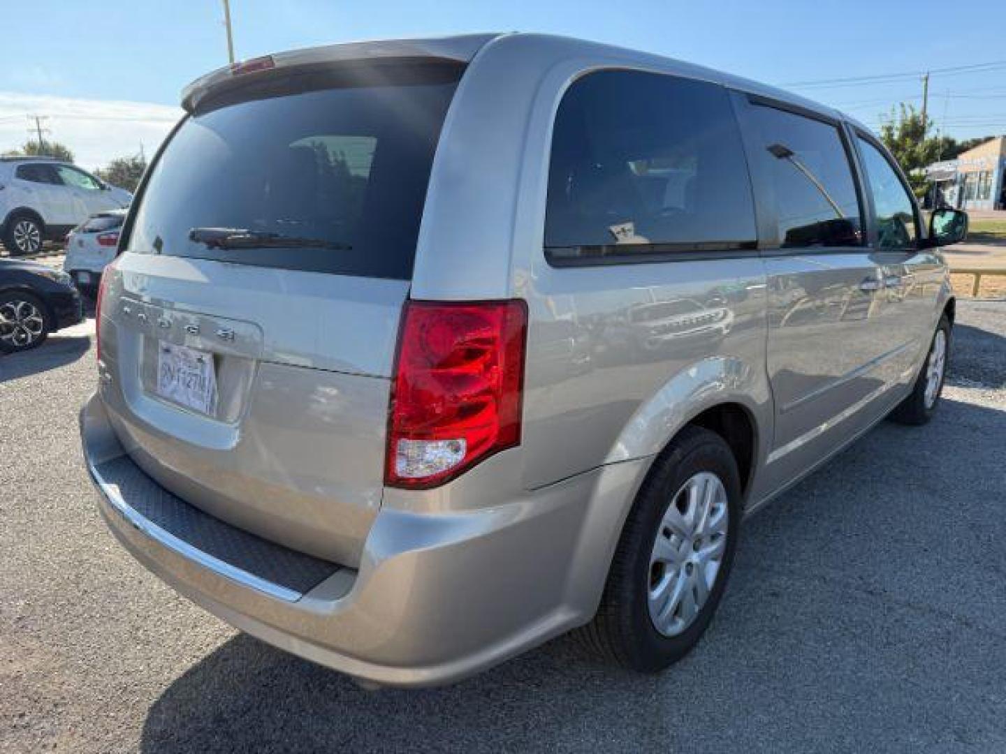 2014 TAN Dodge Grand Caravan SE (2C4RDGBGXER) with an 3.6L V6 DOHC 24V engine, 6-Speed Automatic transmission, located at 2715 W Pioneer Pkwy, Arlington, TX, 76013, (817) 265-9009, 32.710262, -97.153236 - Photo#5