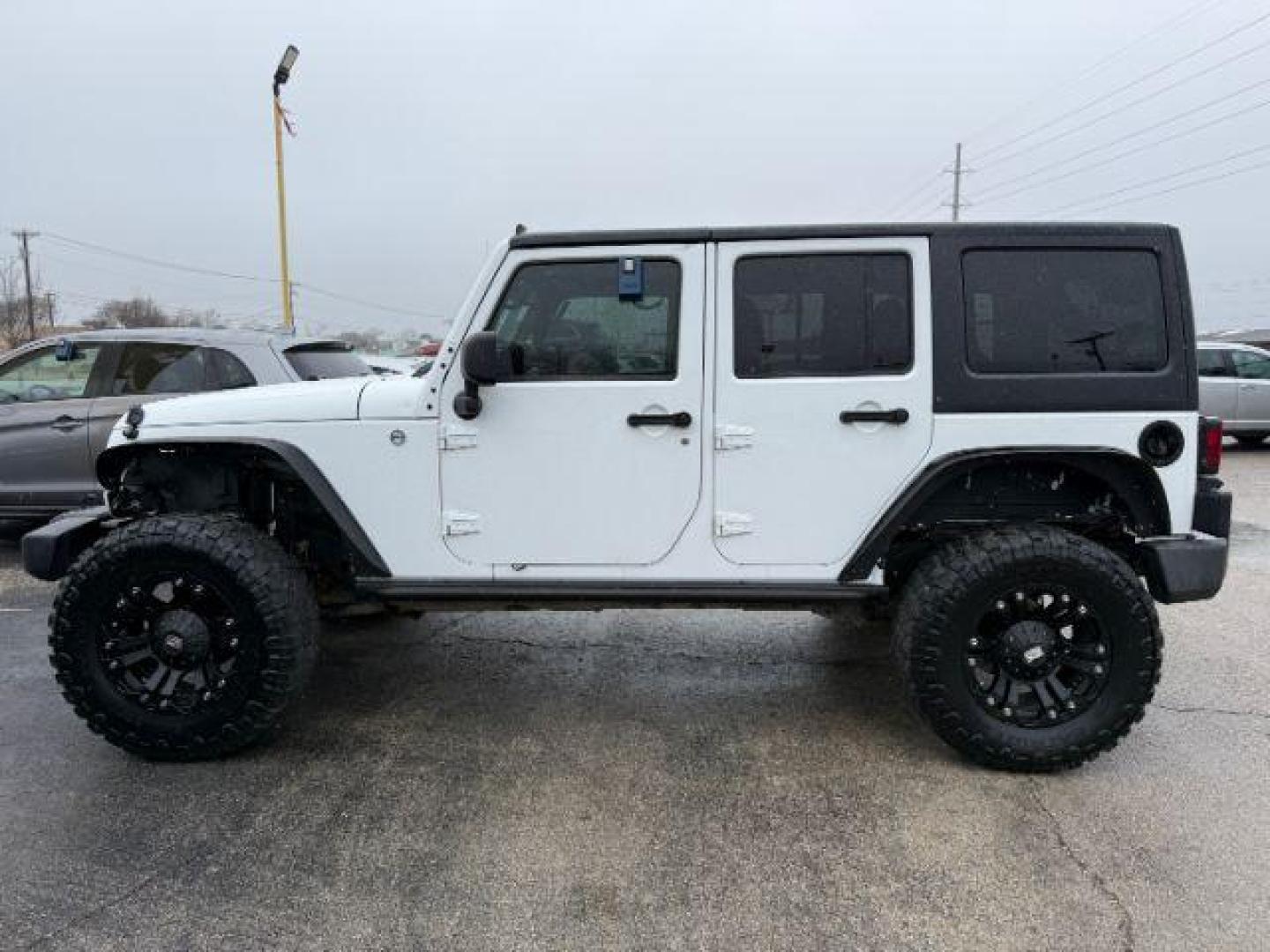 2013 WHITE Jeep Wrangler Unlimited Sport 4WD (1C4BJWDG0DL) with an 3.6L V6 DOHC 24V FFV engine, located at 2715 W Pioneer Pkwy, Arlington, TX, 76013, (817) 265-9009, 32.710262, -97.153236 - Photo#2